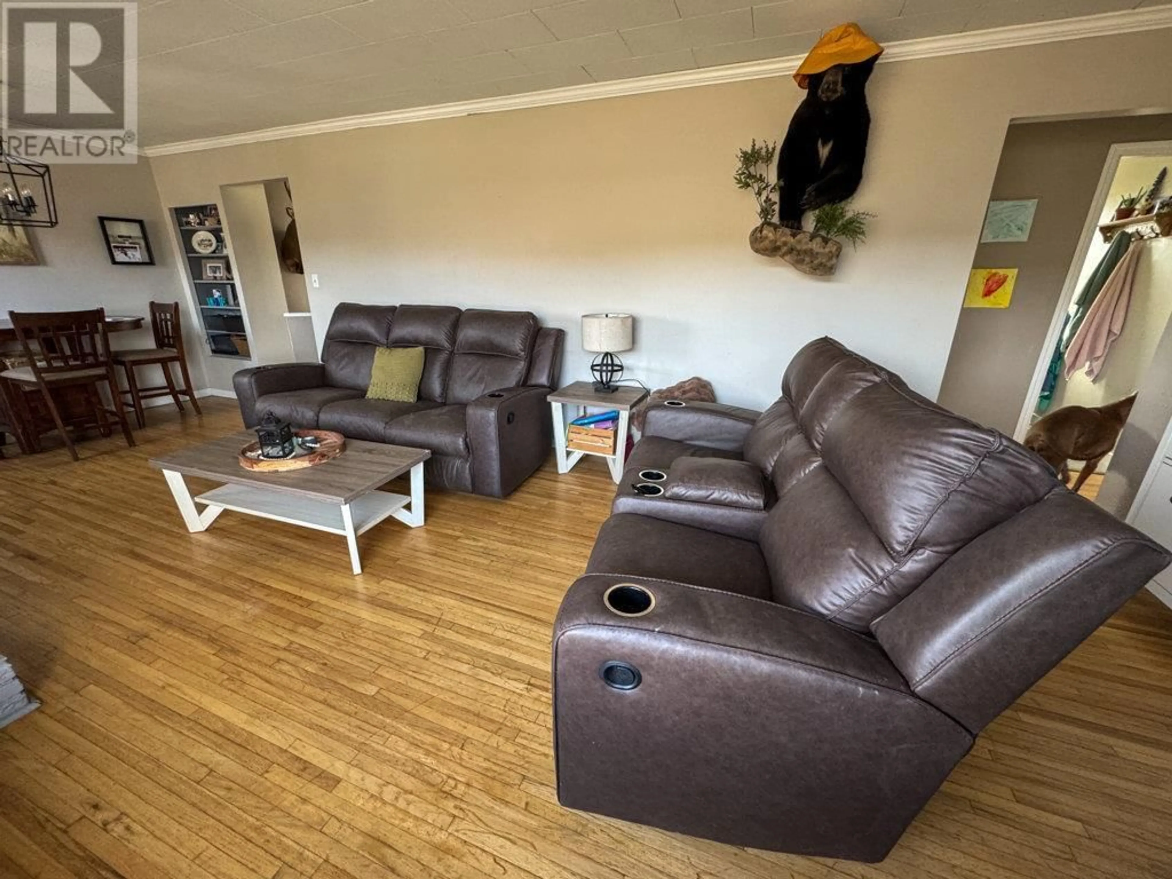 Living room with furniture, wood/laminate floor for 1648 LINDLEY CREEK ROAD, Merritt British Columbia V1K1L4