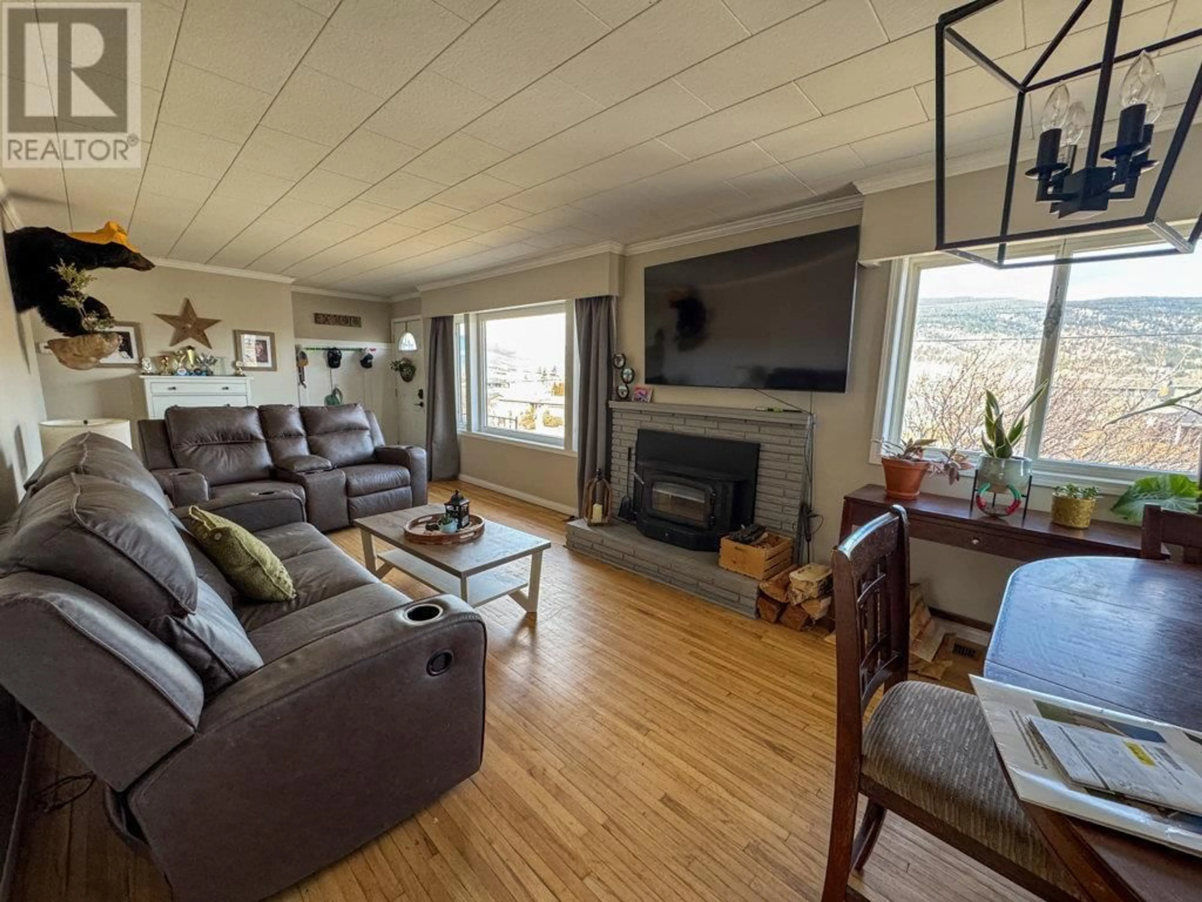 Living room with furniture, wood/laminate floor for 1648 LINDLEY CREEK ROAD, Merritt British Columbia V1K1L4