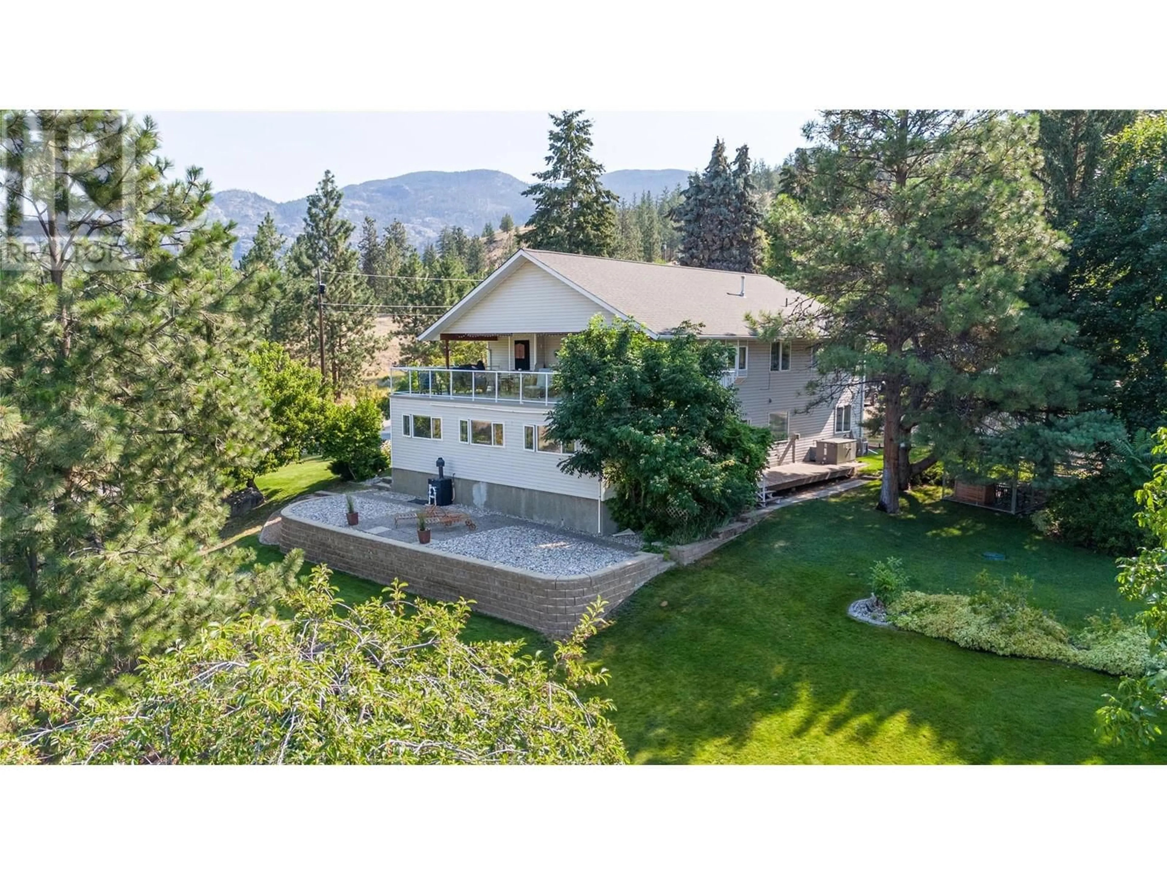 A pic from outside/outdoor area/front of a property/back of a property/a pic from drone, mountain view for 483 PHILPOTT ROAD, Okanagan Falls British Columbia V0H1R5