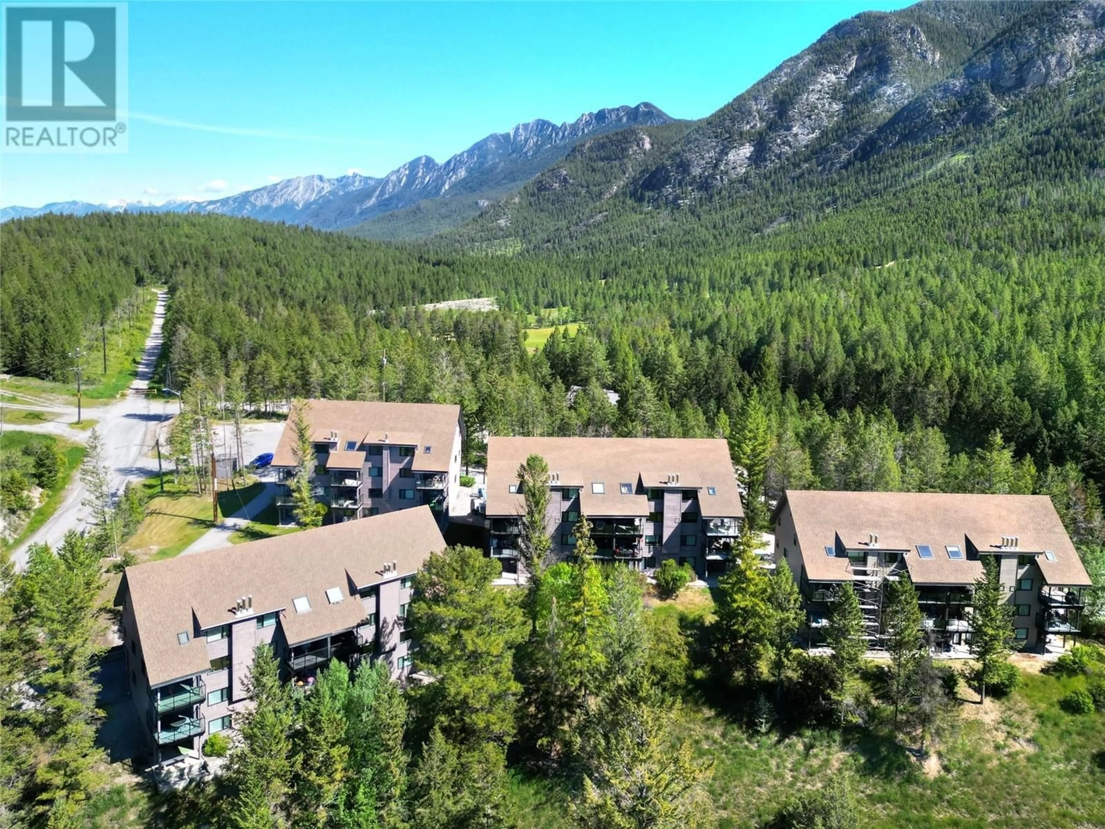 A pic from outside/outdoor area/front of a property/back of a property/a pic from drone, mountain view for 9 - 8040 RADIUM GOLF COURSE ROAD, Radium Hot Springs British Columbia V0A1M0