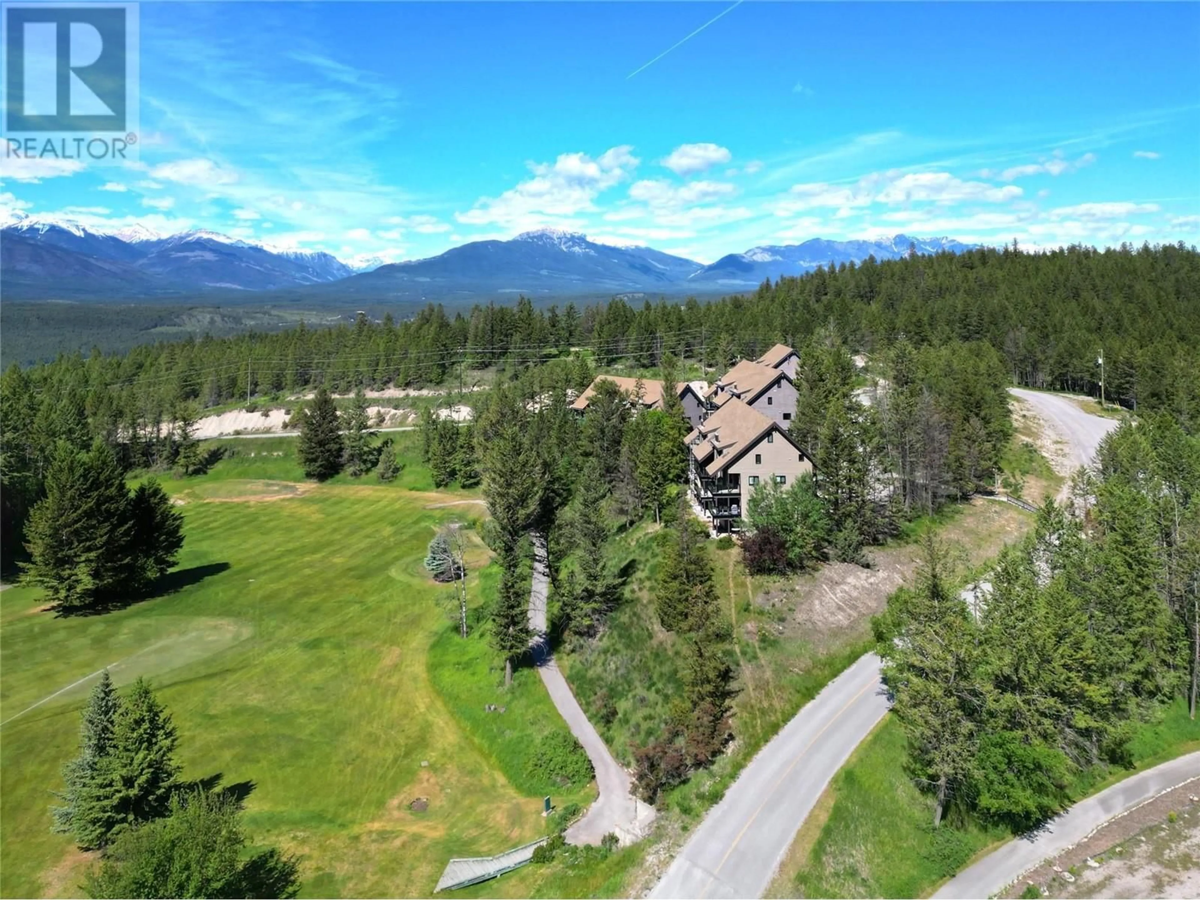 A pic from outside/outdoor area/front of a property/back of a property/a pic from drone, mountain view for 9 - 8040 RADIUM GOLF COURSE ROAD, Radium Hot Springs British Columbia V0A1M0
