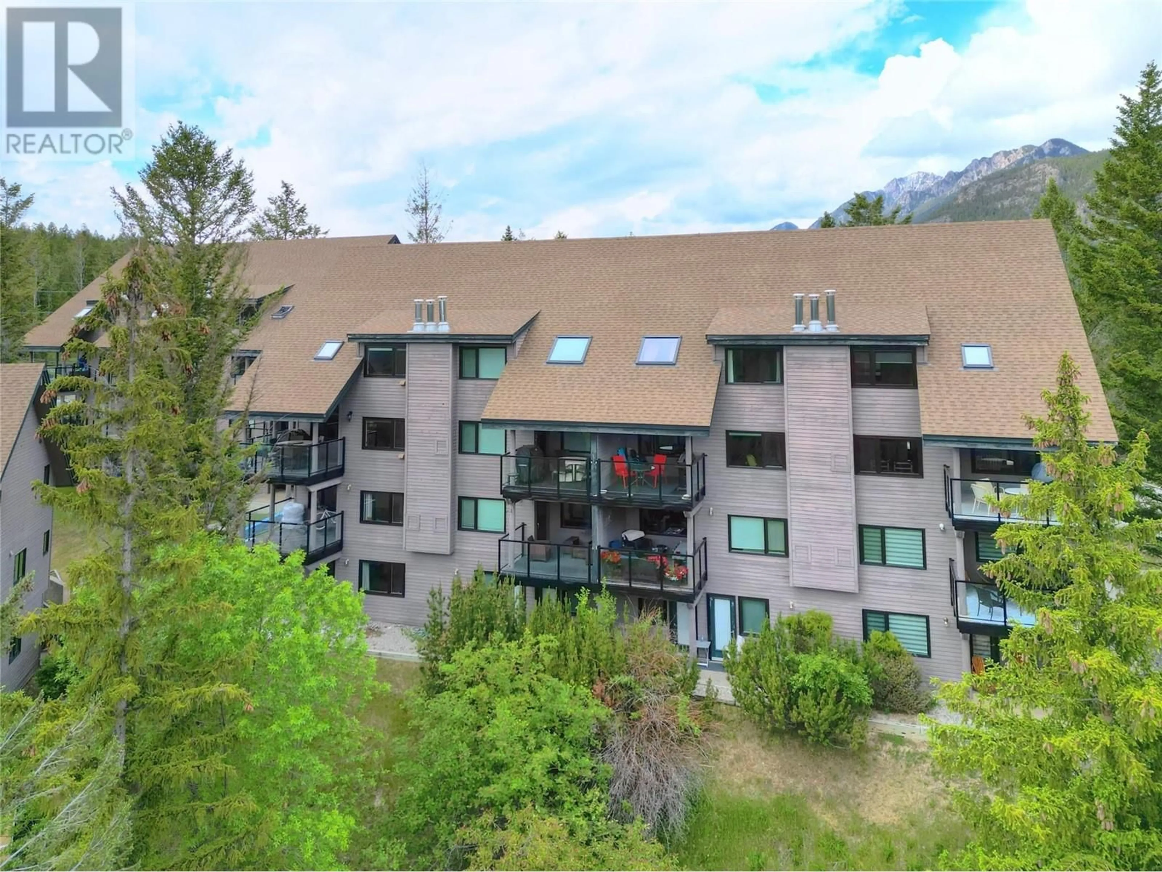 A pic from outside/outdoor area/front of a property/back of a property/a pic from drone, mountain view for 9 - 8040 RADIUM GOLF COURSE ROAD, Radium Hot Springs British Columbia V0A1M0