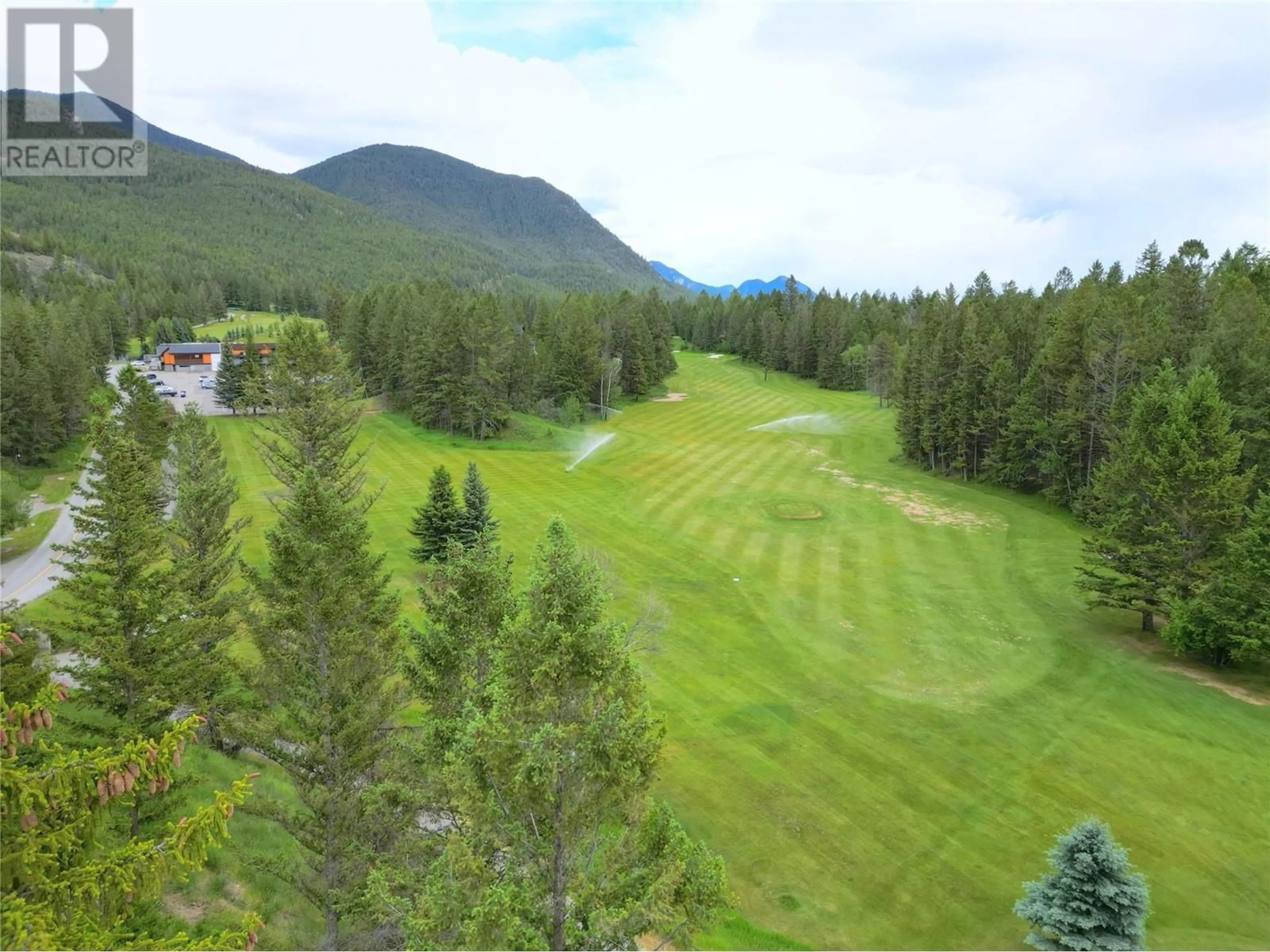 A pic from outside/outdoor area/front of a property/back of a property/a pic from drone, mountain view for 9 - 8040 RADIUM GOLF COURSE ROAD, Radium Hot Springs British Columbia V0A1M0