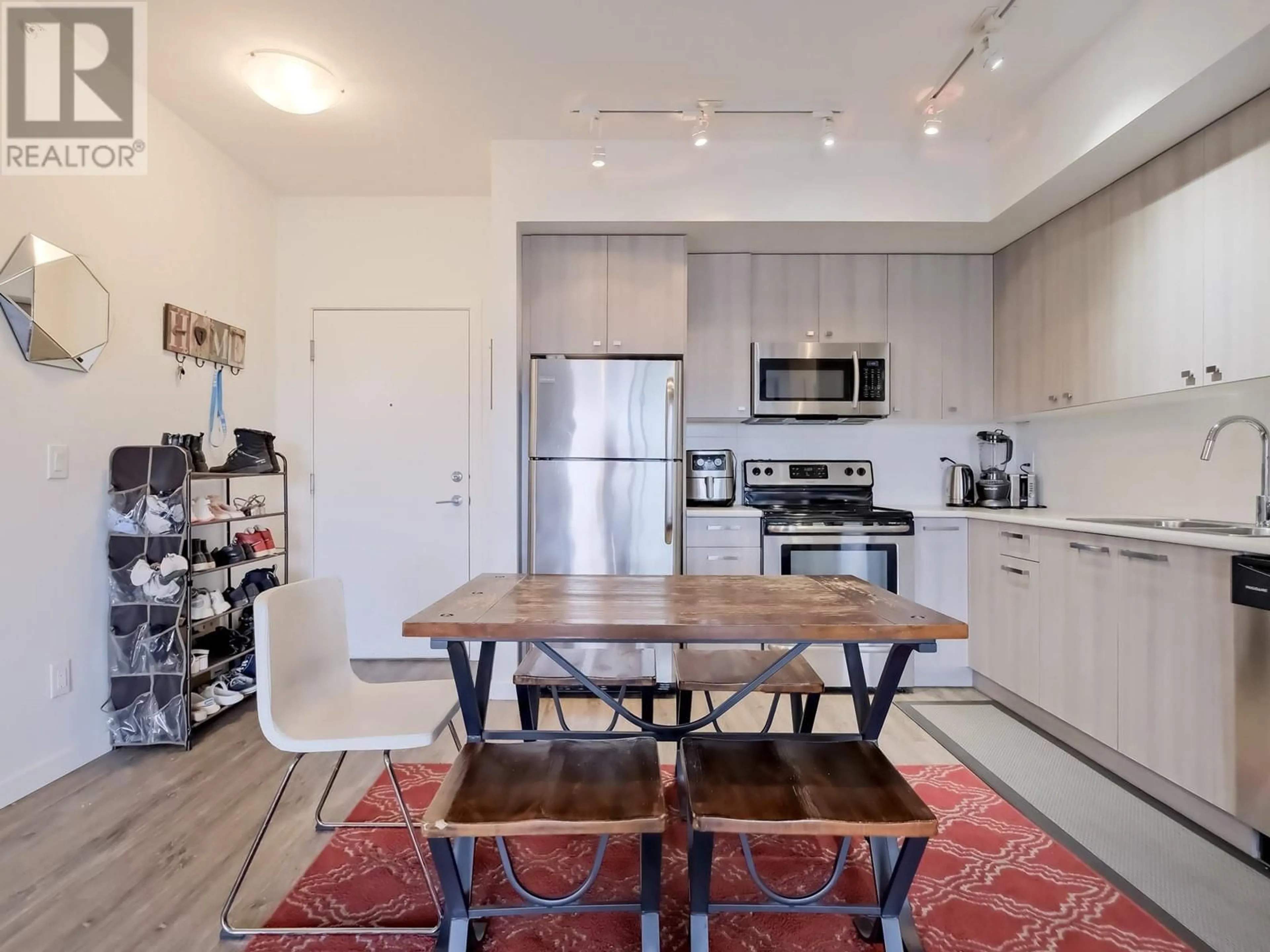 Open concept kitchen, unknown for 306 - 935 ACADEMY WAY, Kelowna British Columbia V1V3A4