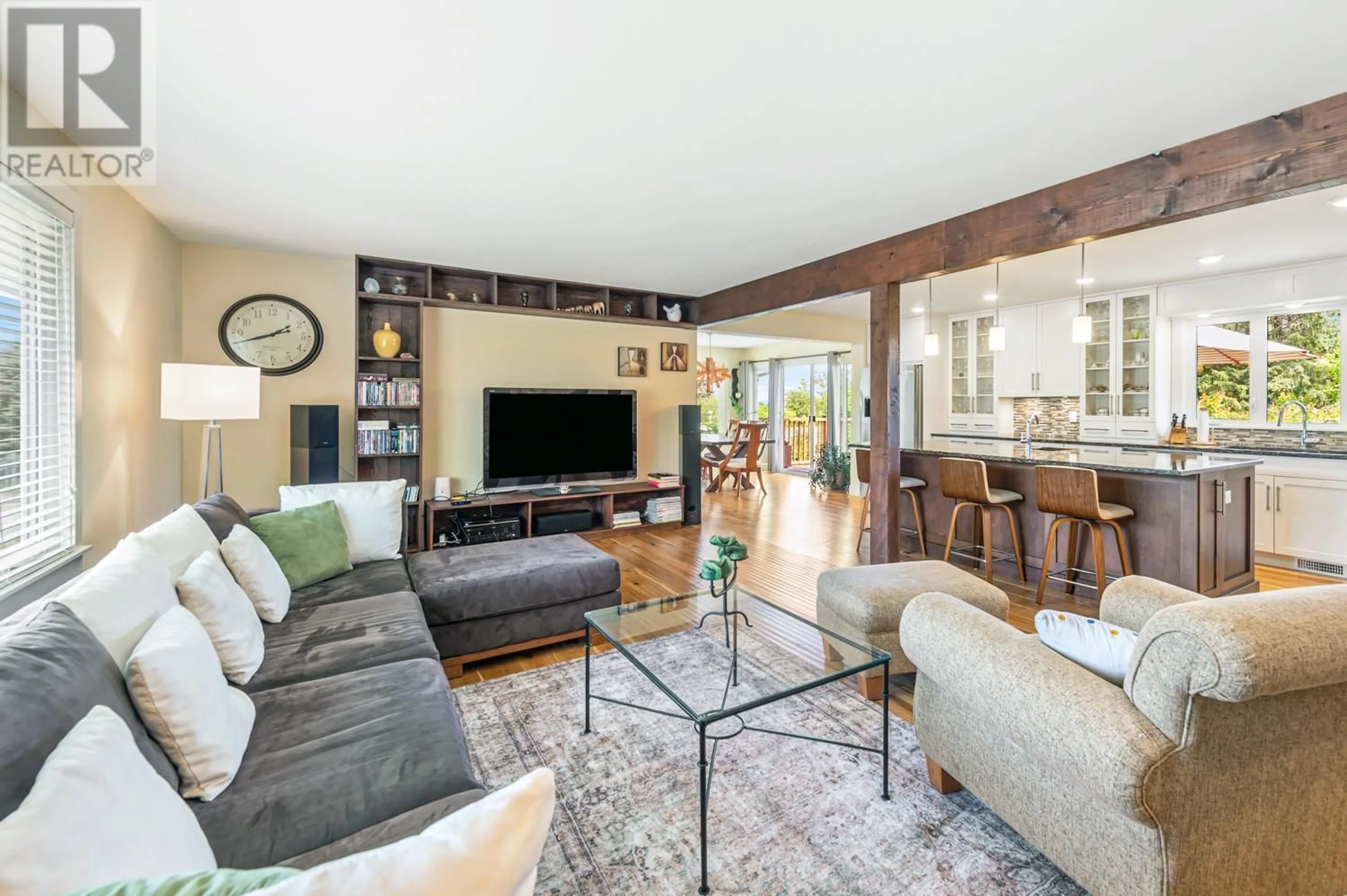 Living room with furniture, wood/laminate floor for 2475 HAYMAN ROAD, West Kelowna British Columbia V1Z2A1