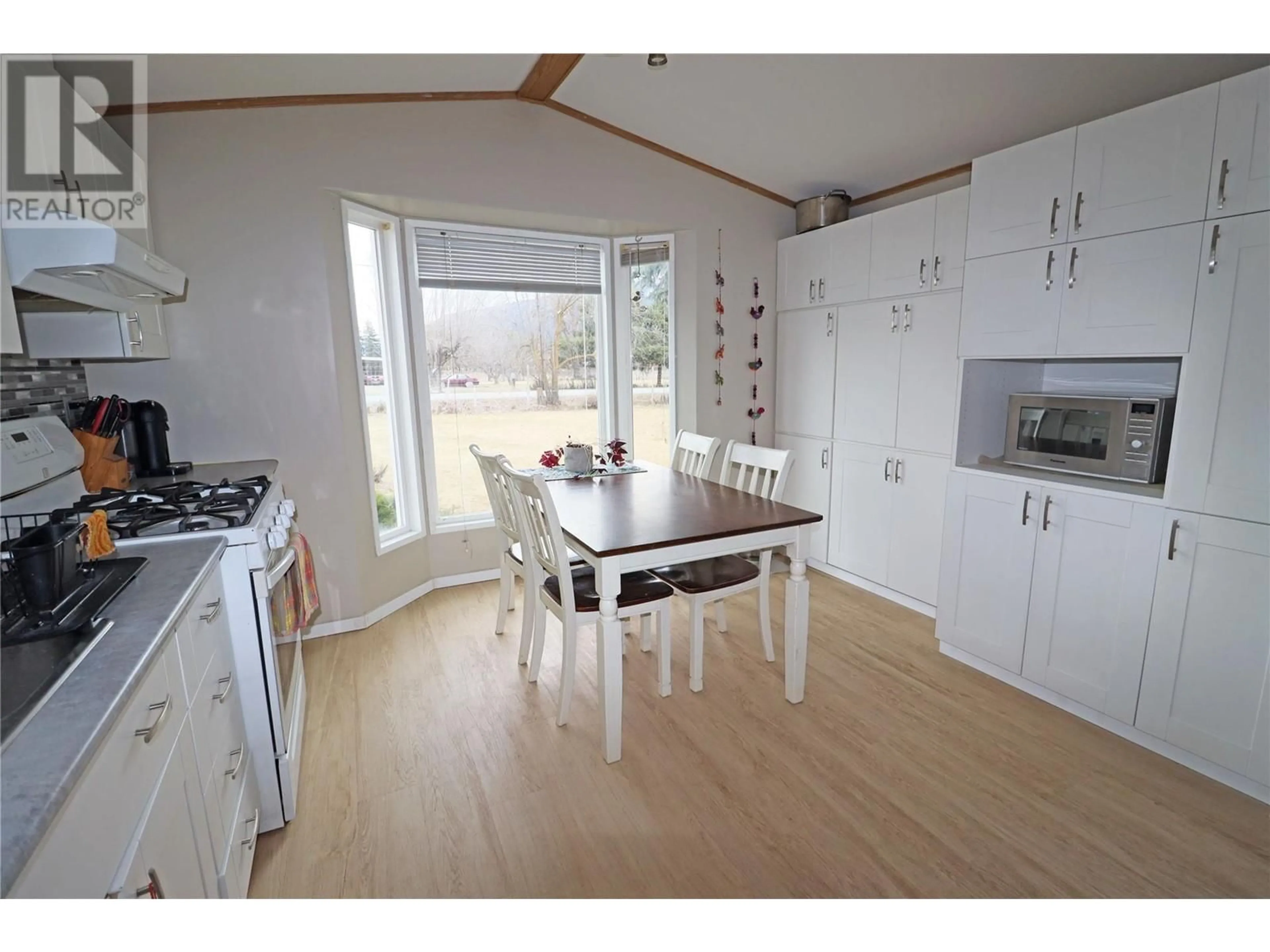 A pic from outside/outdoor area/front of a property/back of a property/a pic from drone, water/lake/river/ocean view for 5595 COOPER ROAD, Grand Forks British Columbia V0H1H4