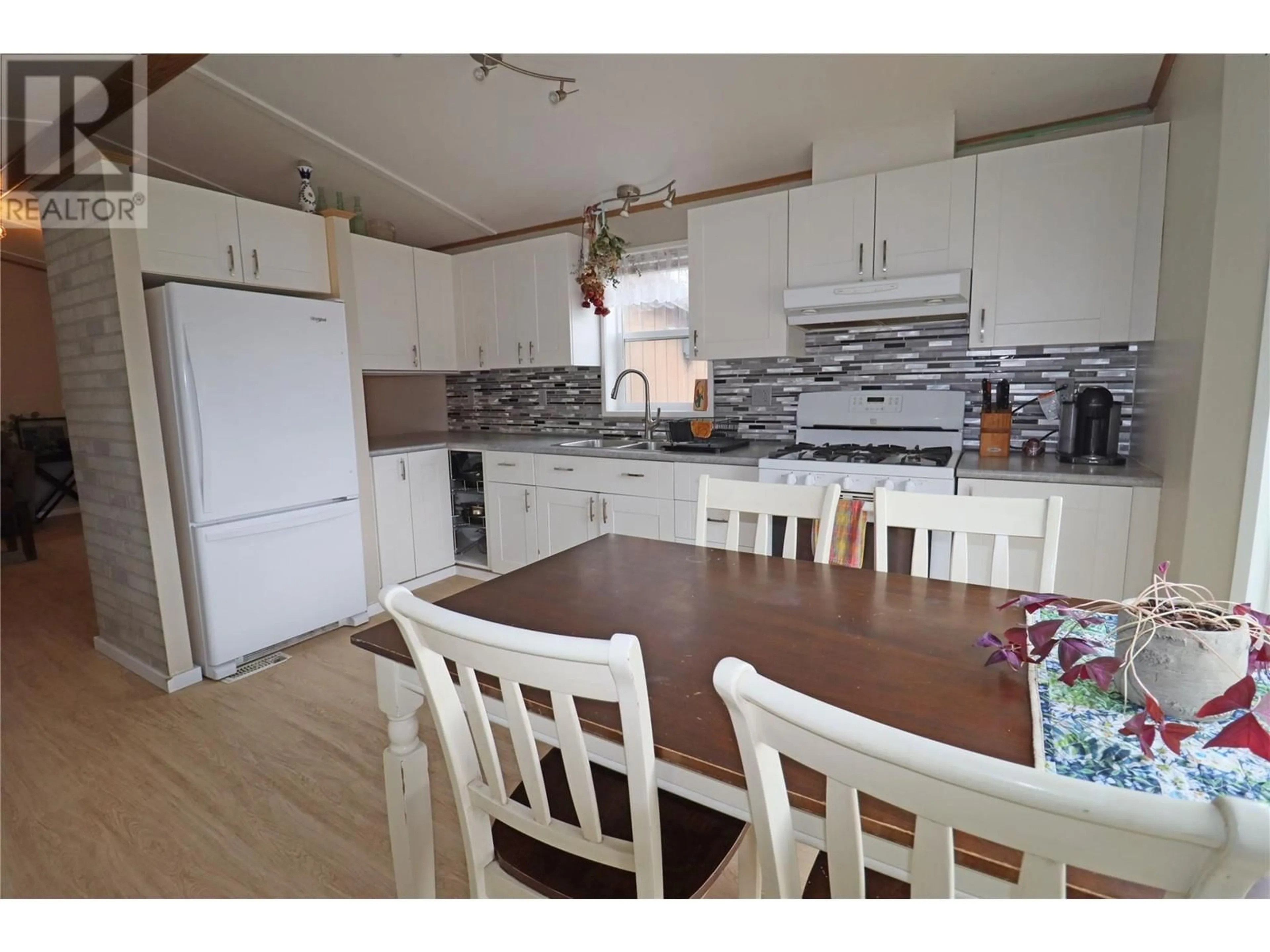 A pic from outside/outdoor area/front of a property/back of a property/a pic from drone, water/lake/river/ocean view for 5595 COOPER ROAD, Grand Forks British Columbia V0H1H4