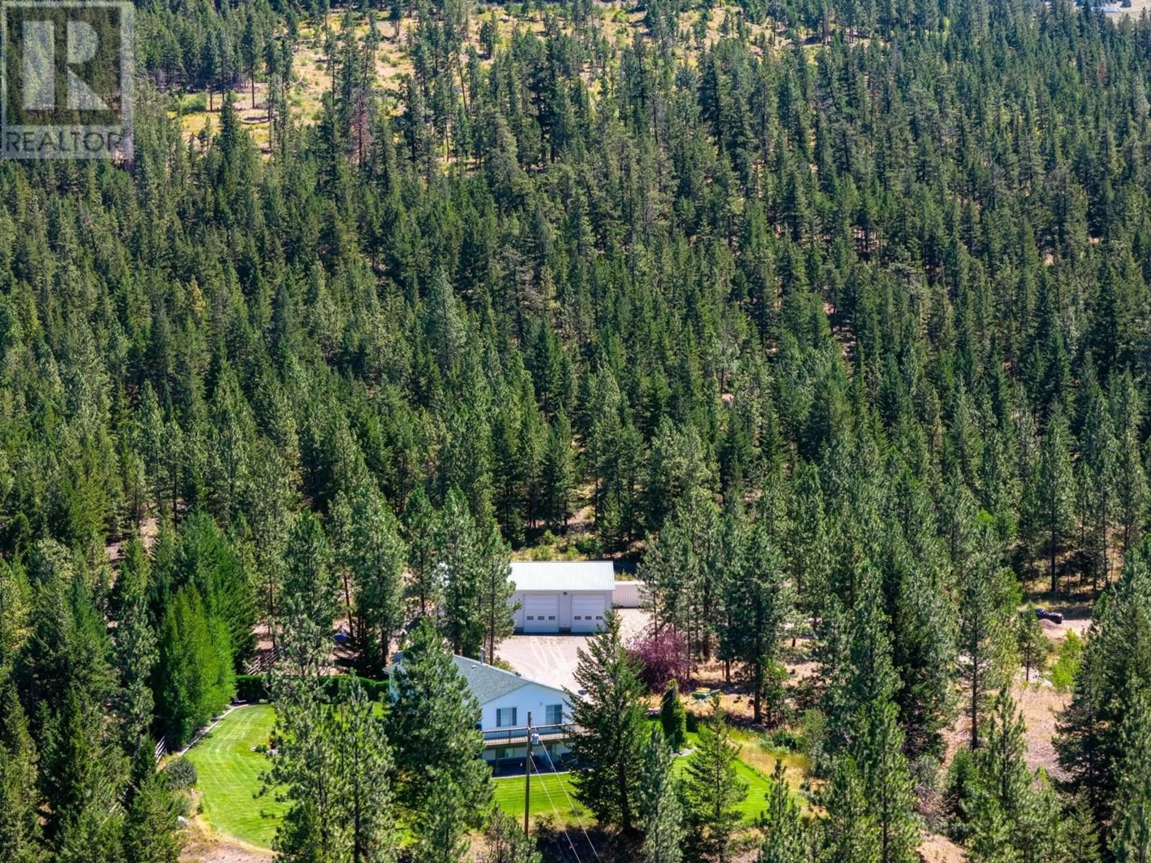 A pic from outside/outdoor area/front of a property/back of a property/a pic from drone, forest/trees view for 116 COLDWATER ROAD, Merritt British Columbia V1K1B8