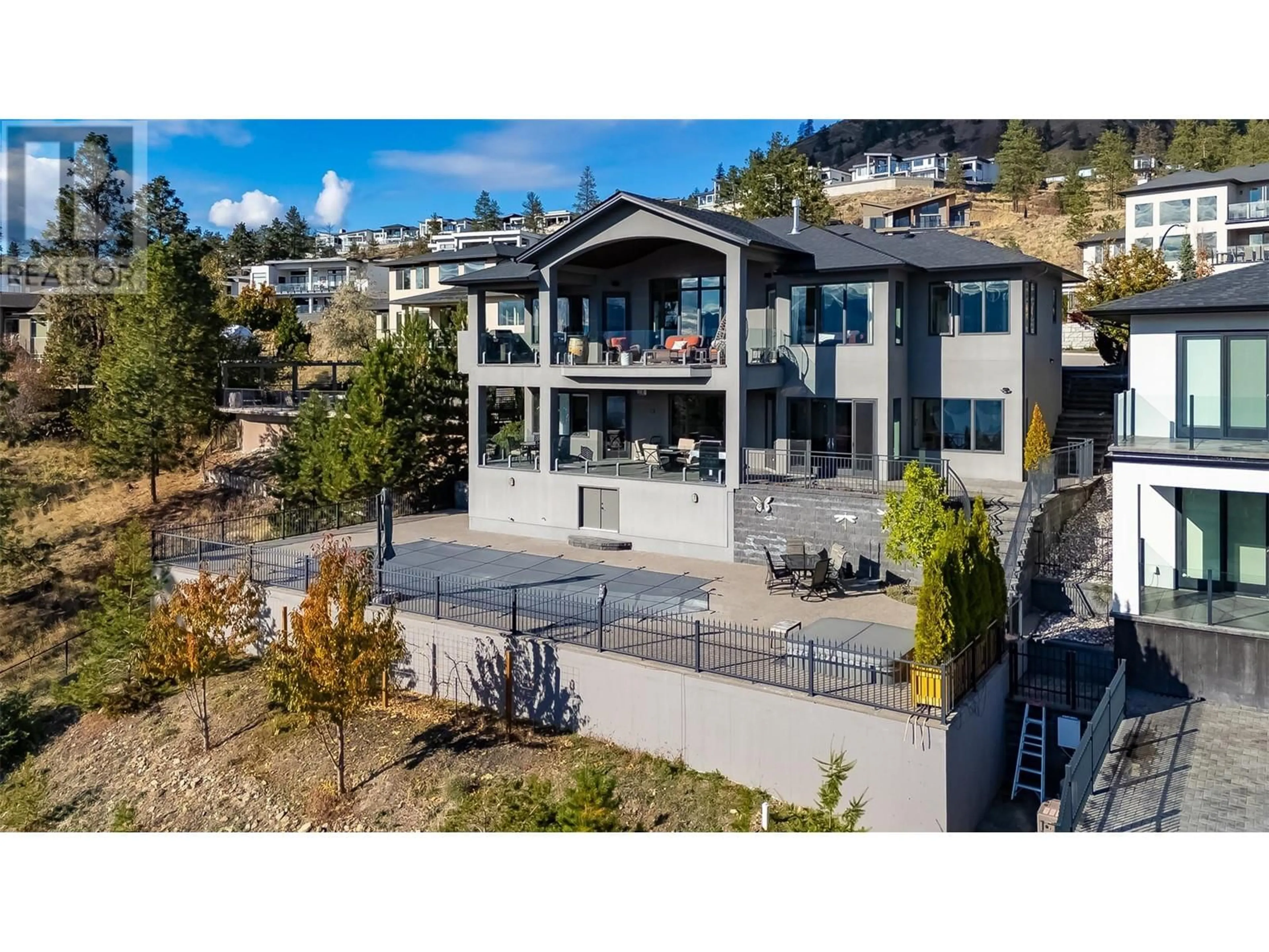 A pic from outside/outdoor area/front of a property/back of a property/a pic from drone, mountain view for 1505 PINOT NOIR DRIVE, West Kelowna British Columbia V4T3B4