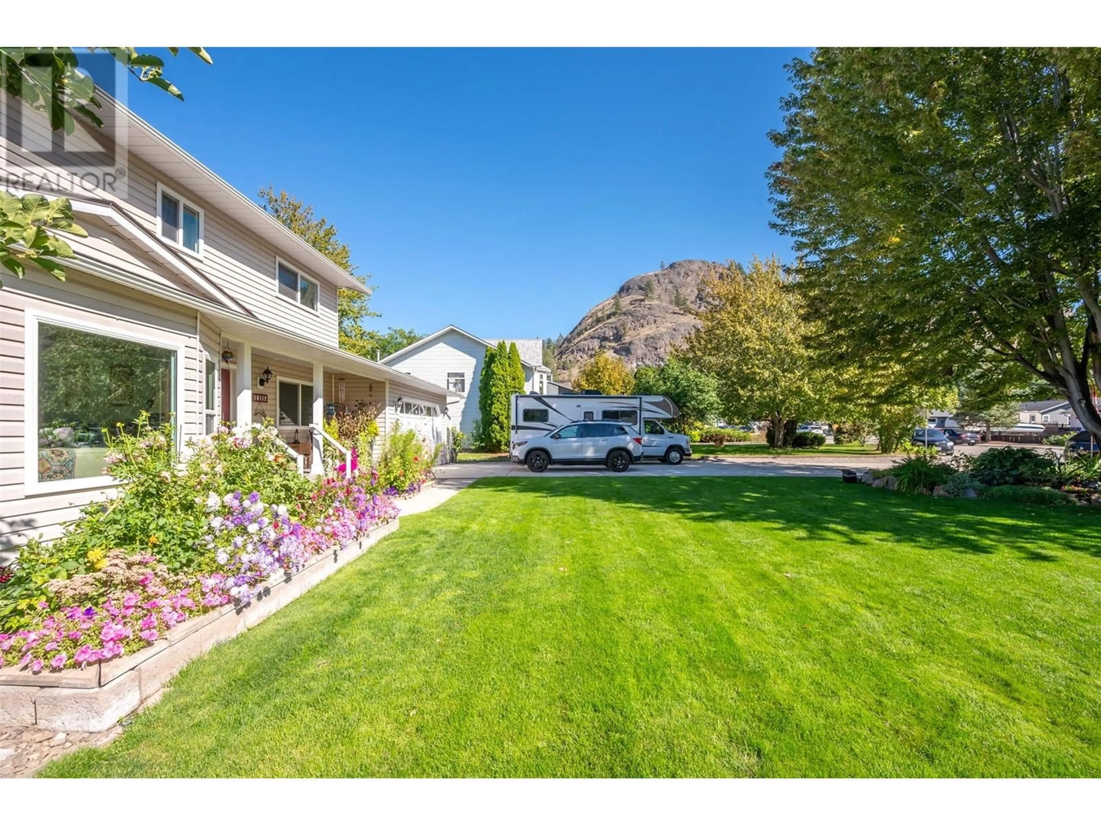 A pic from outside/outdoor area/front of a property/back of a property/a pic from drone, mountain view for 10112 BEAVIS PLACE, Summerland British Columbia V0H1Z2