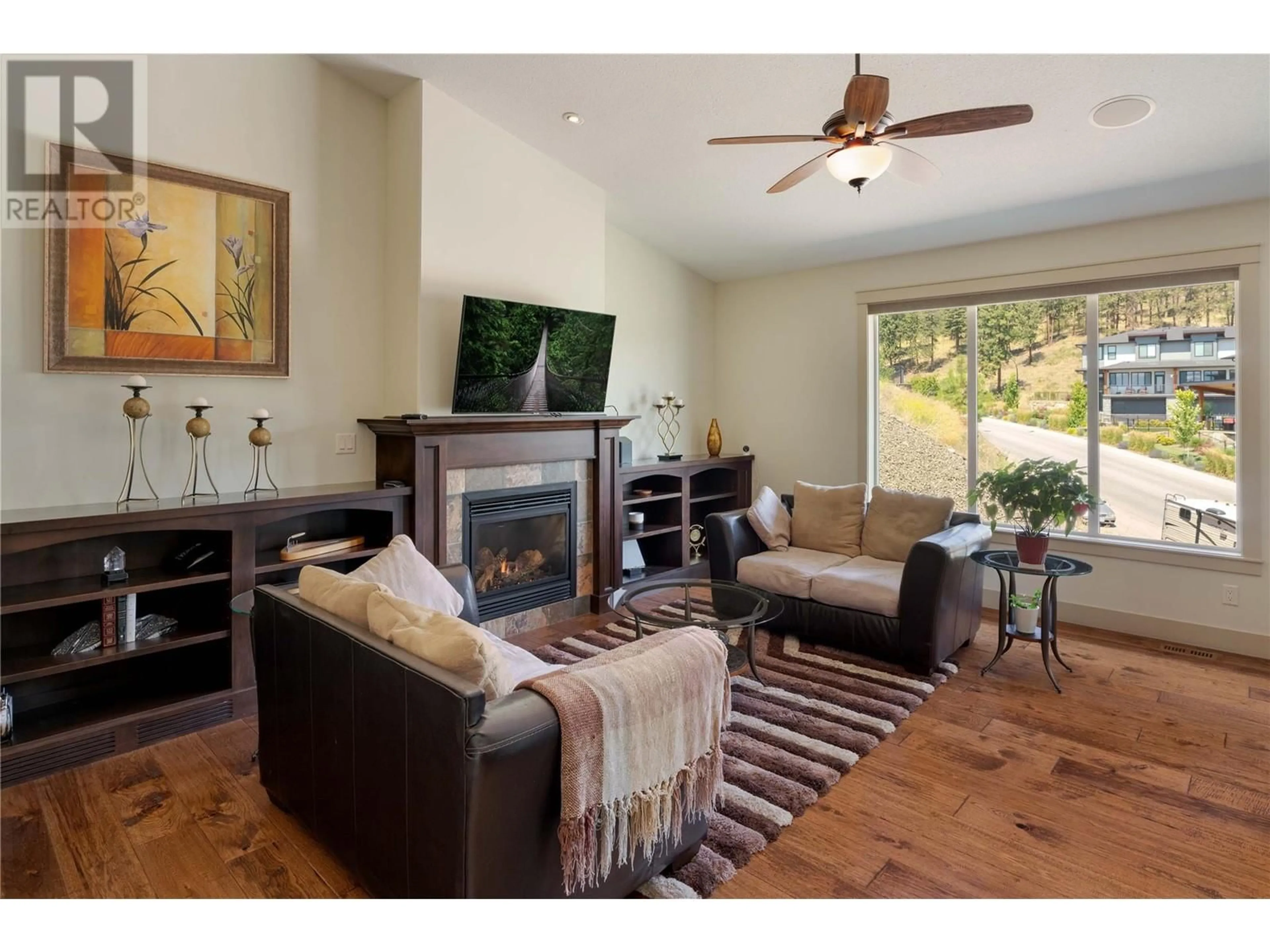 Living room with furniture, wood/laminate floor for 2390 TALLUS RIDGE DRIVE, West Kelowna British Columbia V4T3H5