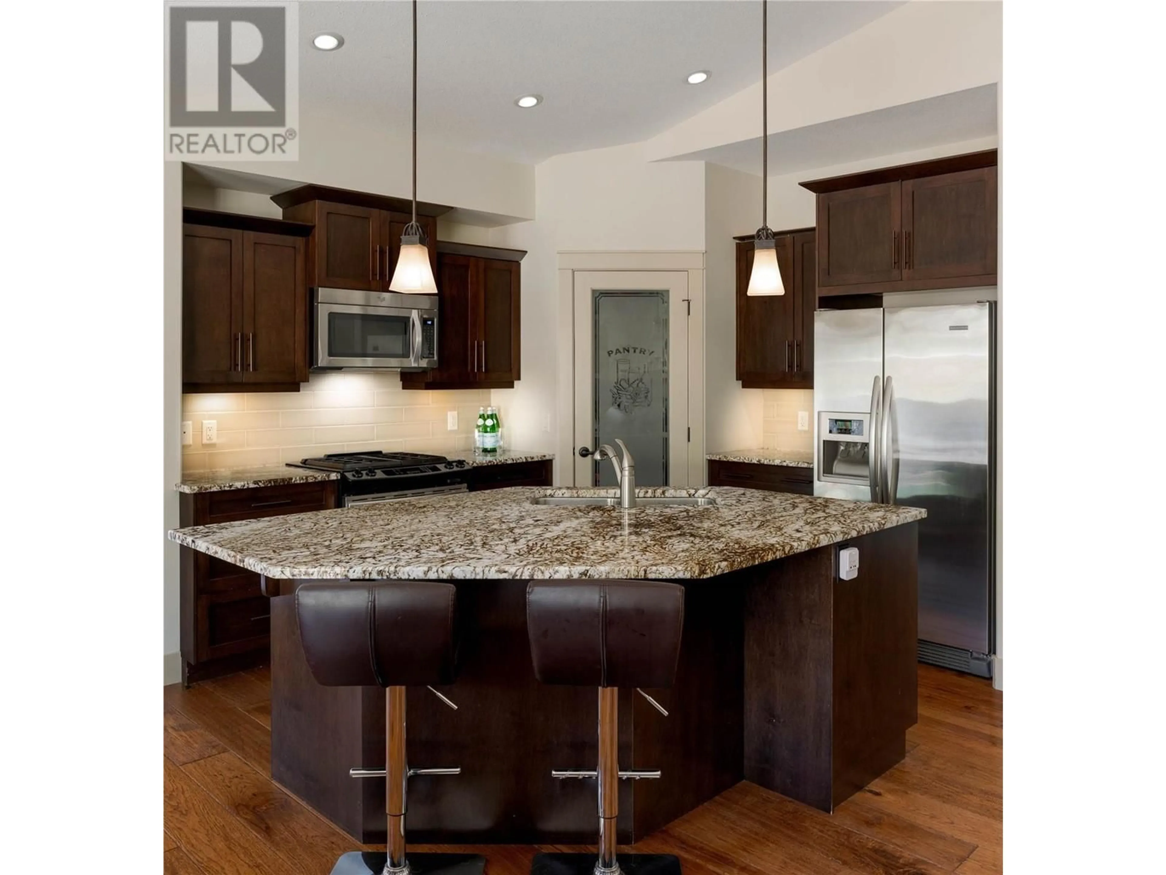 Open concept kitchen, wood/laminate floor for 2390 TALLUS RIDGE DRIVE, West Kelowna British Columbia V4T3H5