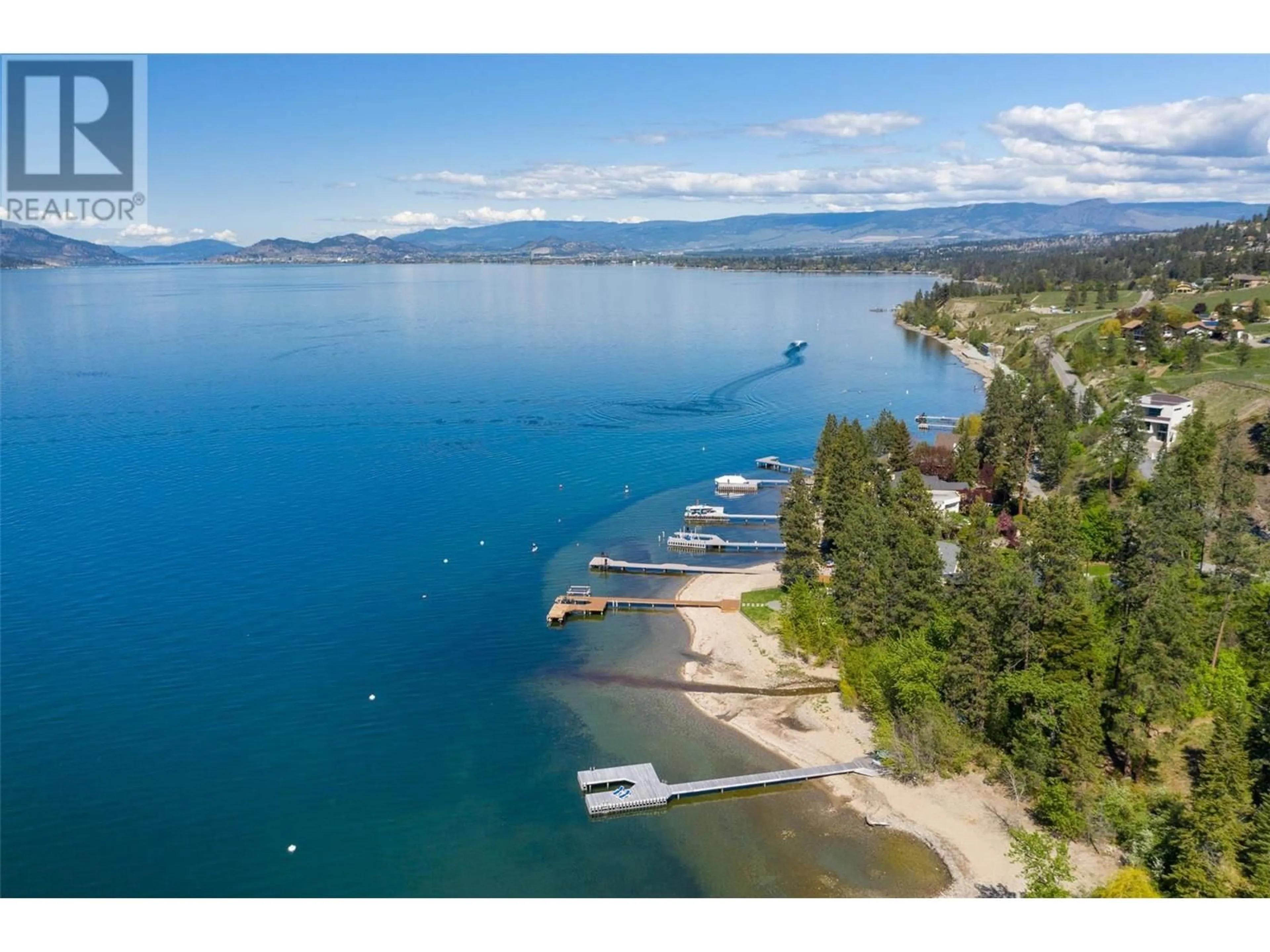 A pic from outside/outdoor area/front of a property/back of a property/a pic from drone, water/lake/river/ocean view for 5308 LAKESHORE ROAD, Kelowna British Columbia V1W4J3