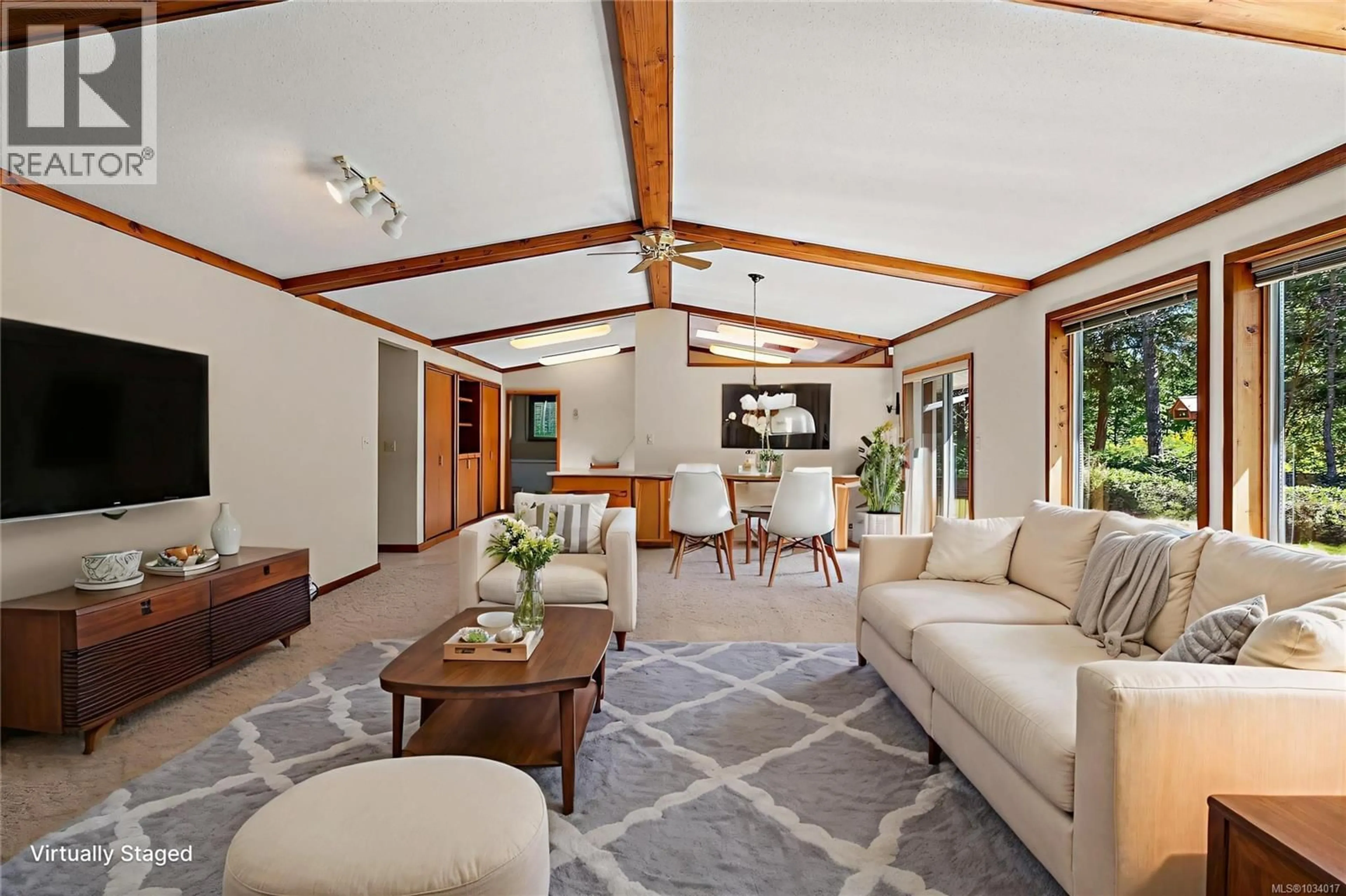 Living room with furniture, unknown for 2468 ARKEN TERRACE, Mill Bay British Columbia V8H1A4