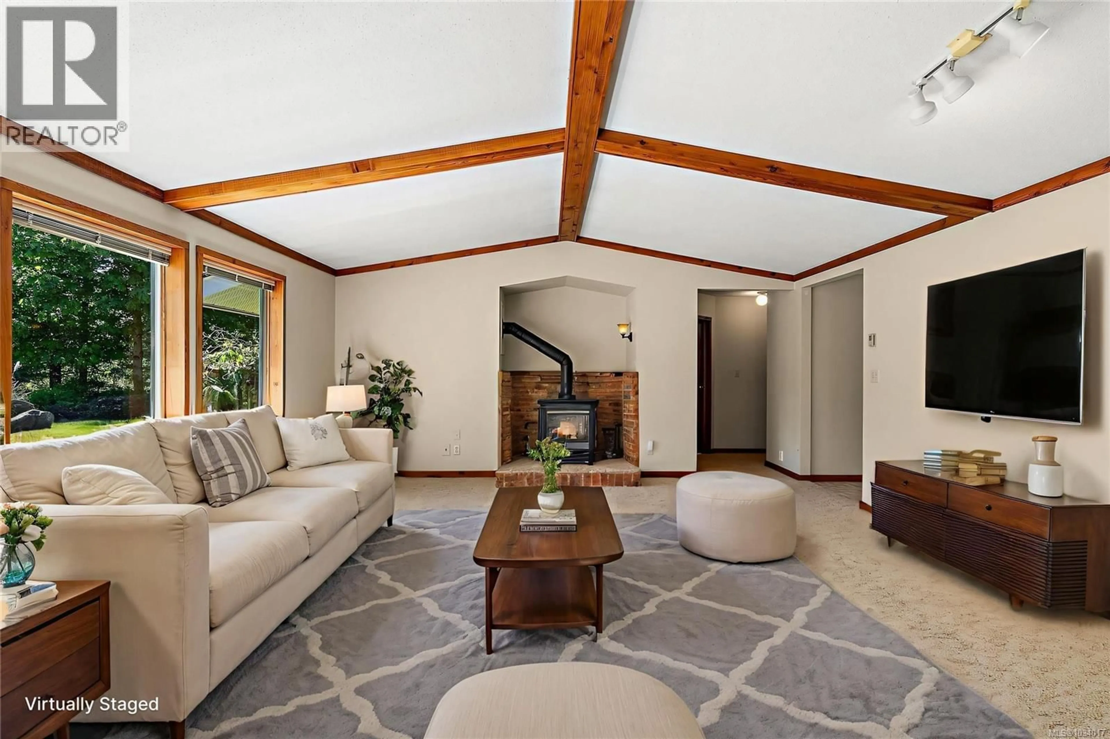 Living room with furniture, unknown for 2468 ARKEN TERRACE, Mill Bay British Columbia V8H1A4