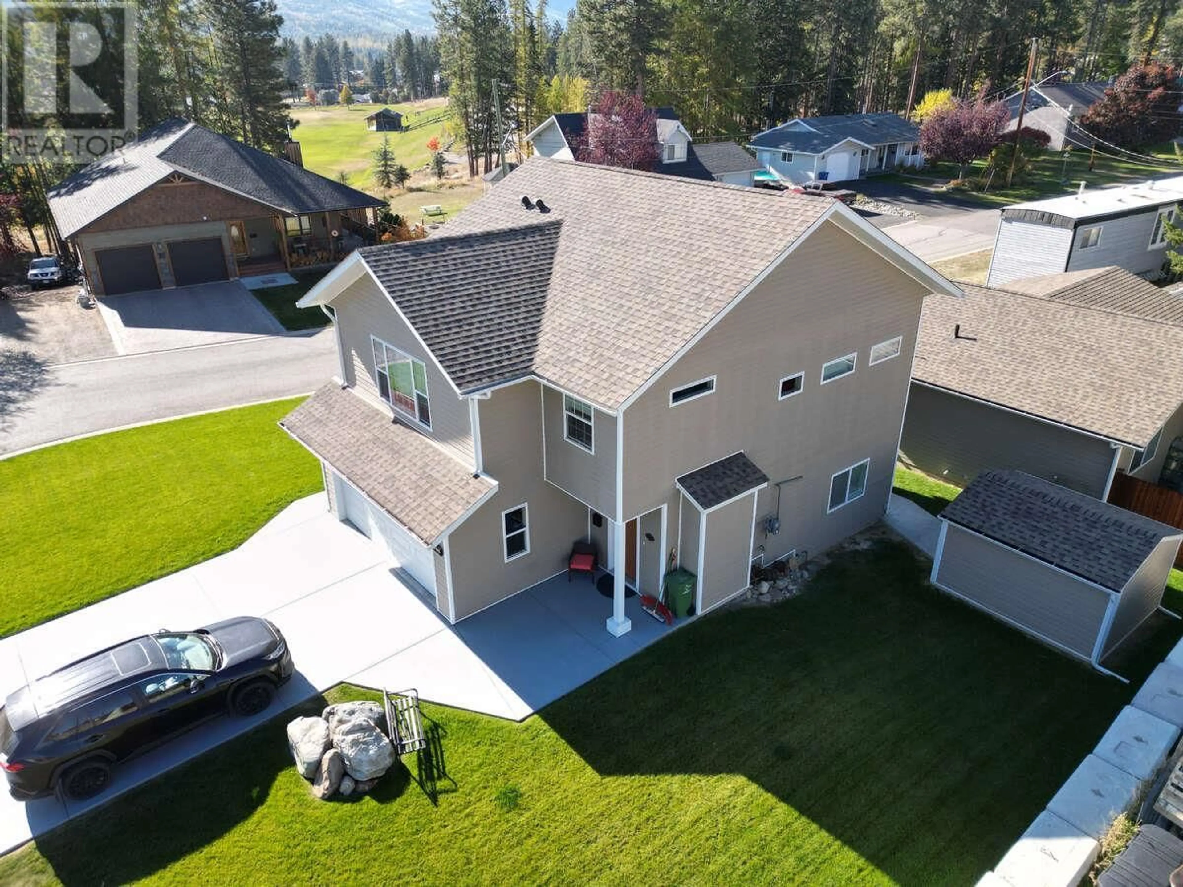 A pic from outside/outdoor area/front of a property/back of a property/a pic from drone, mountain view for 975 313TH DRIVE, Kimberley British Columbia V1A3G9