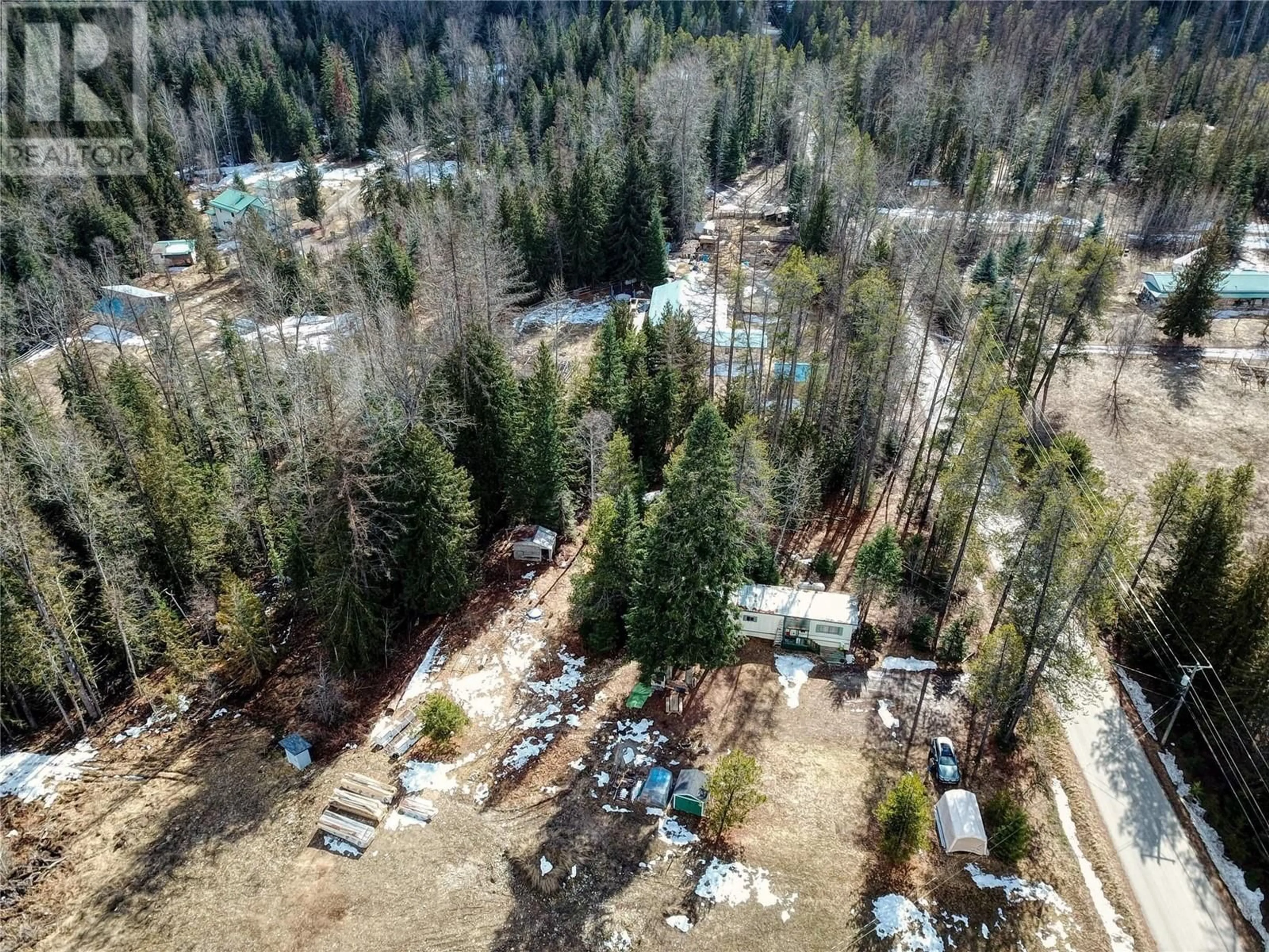 A pic from outside/outdoor area/front of a property/back of a property/a pic from drone, forest/trees view for 1502 WENGER ROAD, Creston British Columbia V0B1G9