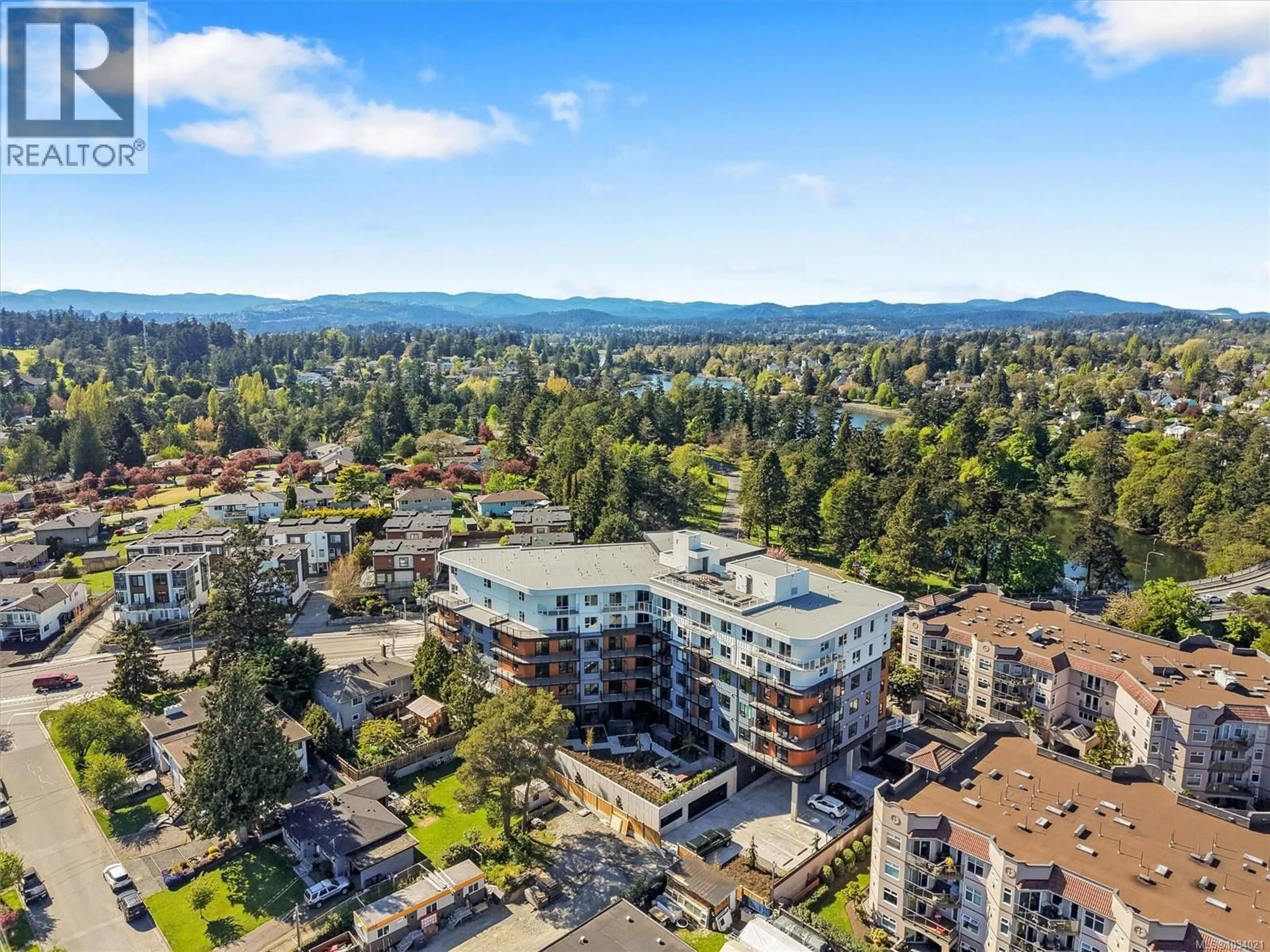 A pic from outside/outdoor area/front of a property/back of a property/a pic from drone, mountain view for 103 - 1075 TILLICUM ROAD, Esquimalt British Columbia V9A2A4