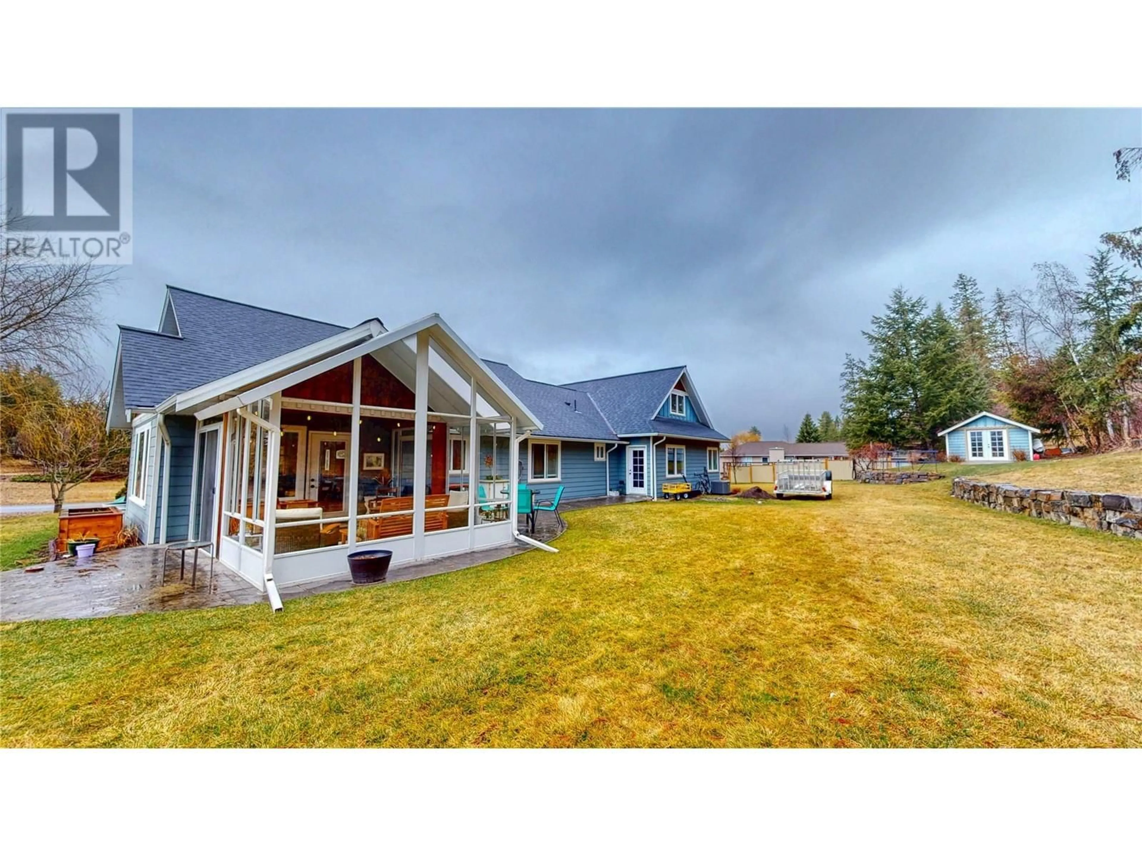 A pic from outside/outdoor area/front of a property/back of a property/a pic from drone, mountain view for 1324 8TH AVENUE NORTH, Creston British Columbia V0B1G6