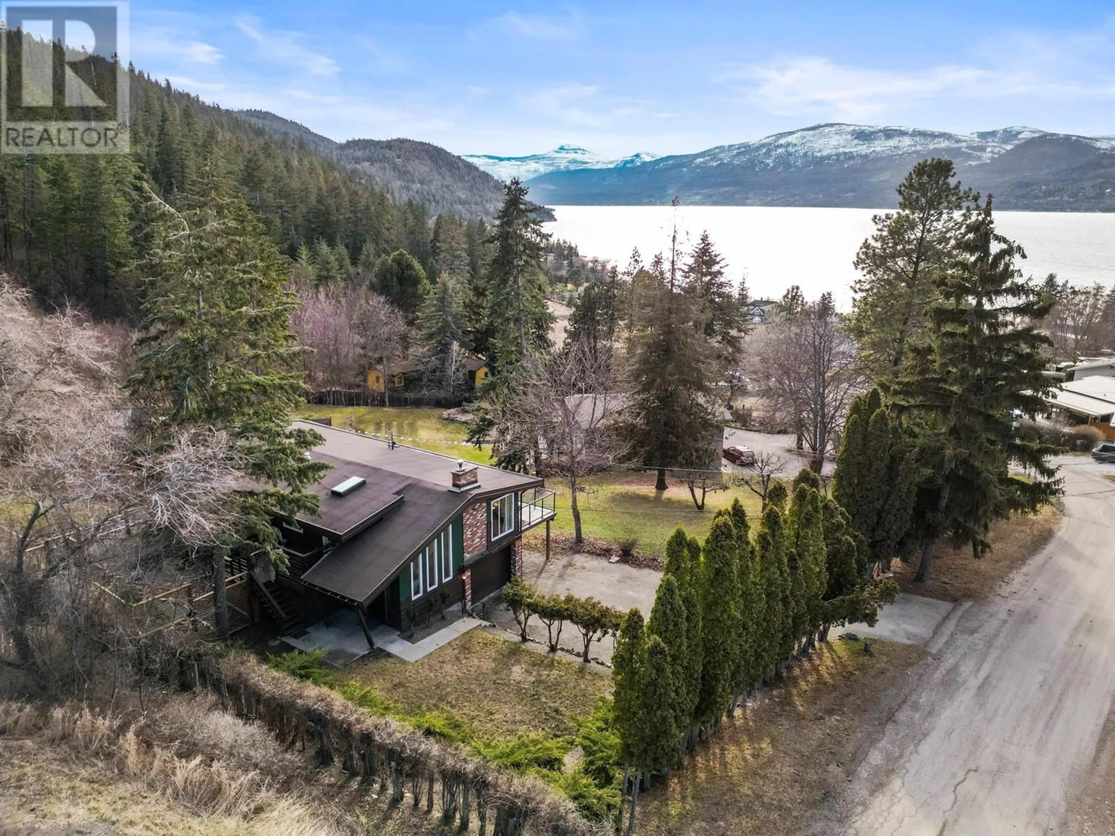 A pic from outside/outdoor area/front of a property/back of a property/a pic from drone, water/lake/river/ocean view for 8550 HARBOUR HEIGHTS ROAD, Vernon British Columbia V1H1J8