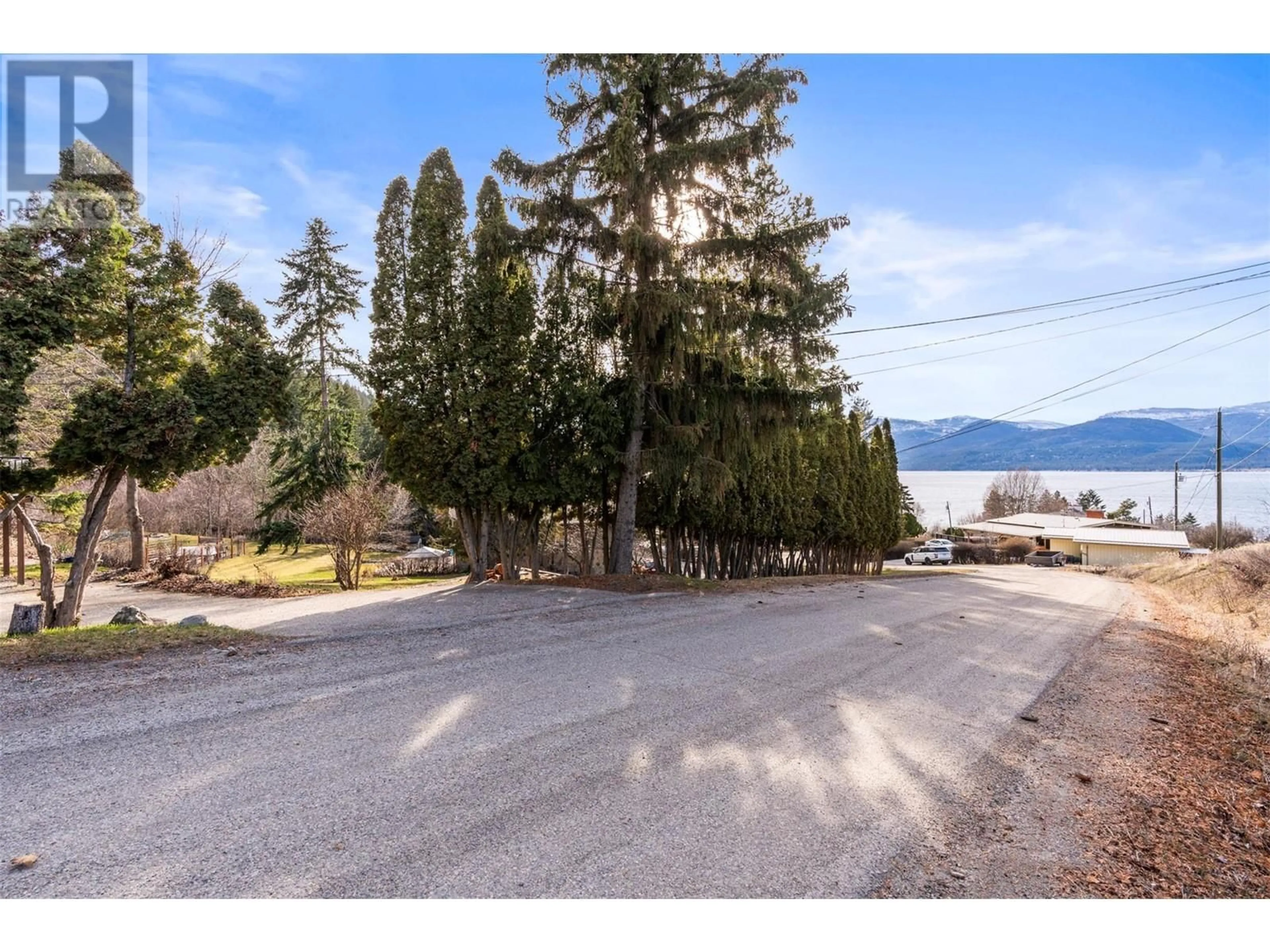 A pic from outside/outdoor area/front of a property/back of a property/a pic from drone, water/lake/river/ocean view for 8550 HARBOUR HEIGHTS ROAD, Vernon British Columbia V1H1J8