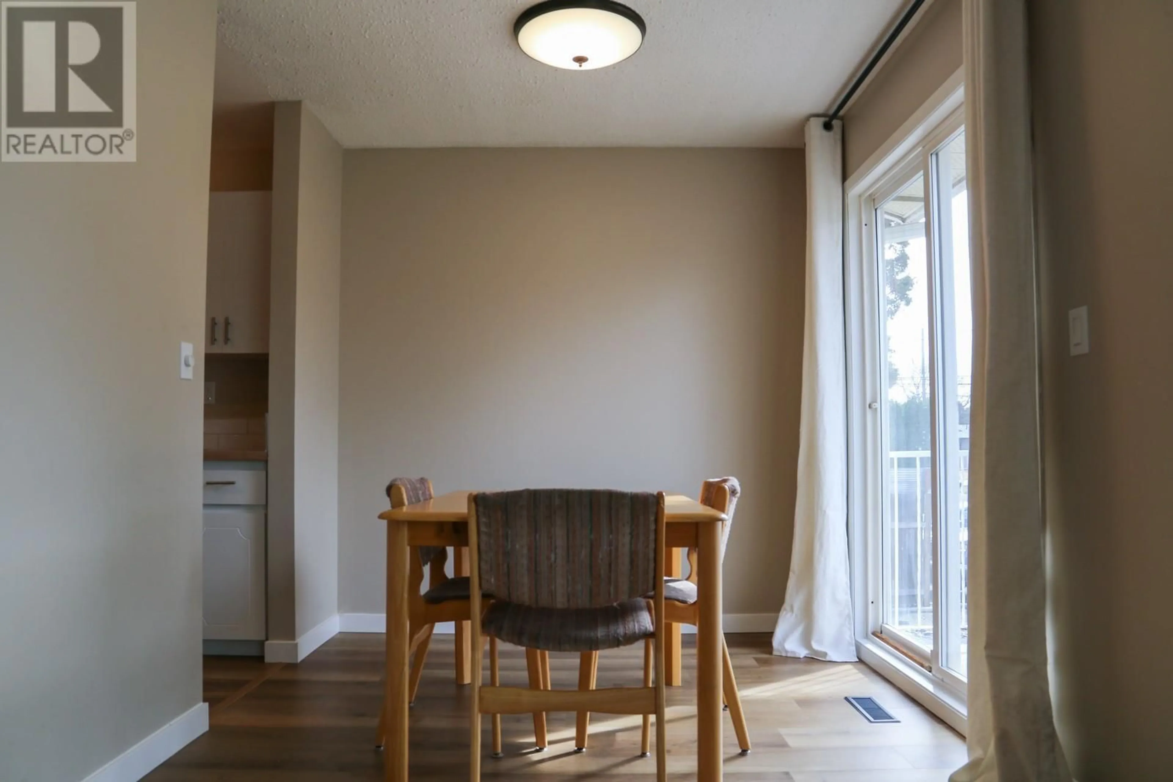 Dining room, wood/laminate floor for 2336 BOSSERT AVENUE, Kamloops British Columbia V2B4V7