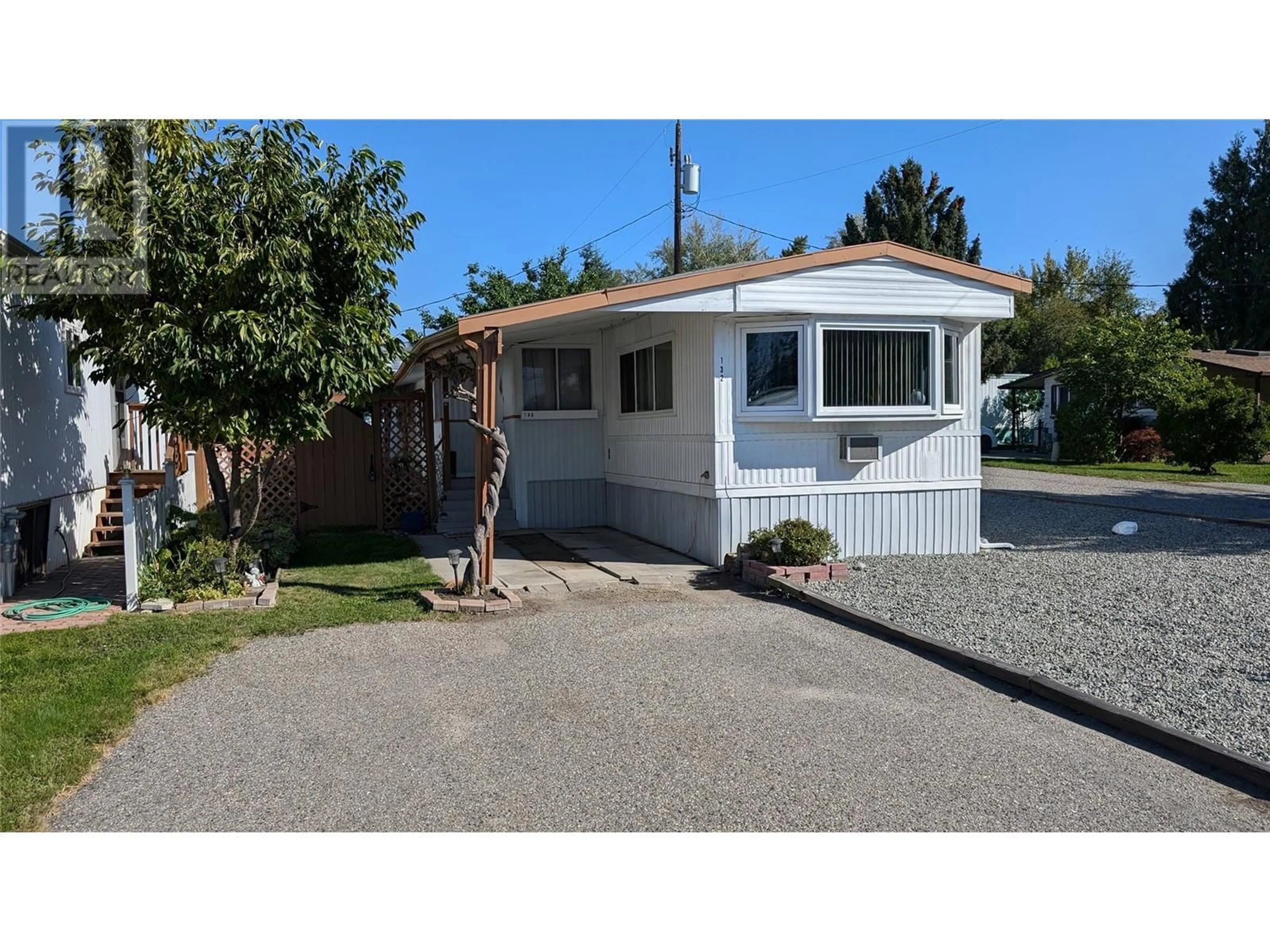 Home with vinyl exterior material, street for 132 - 1880 OLD BOUCHERIE ROAD, West Kelowna British Columbia V4T1Z3