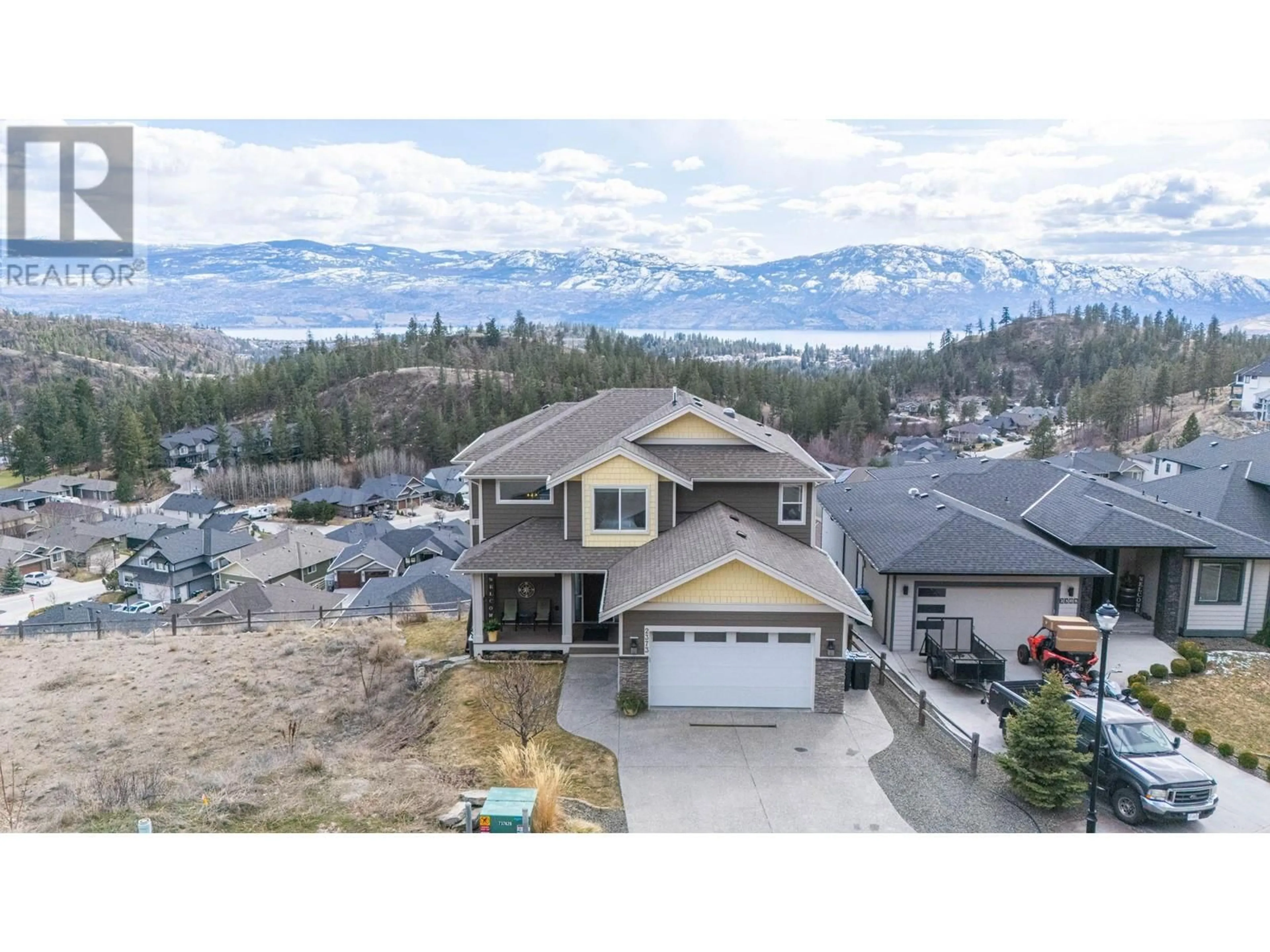 A pic from outside/outdoor area/front of a property/back of a property/a pic from drone, mountain view for 2373 BIG SKY DRIVE, West Kelowna British Columbia V4T3K4