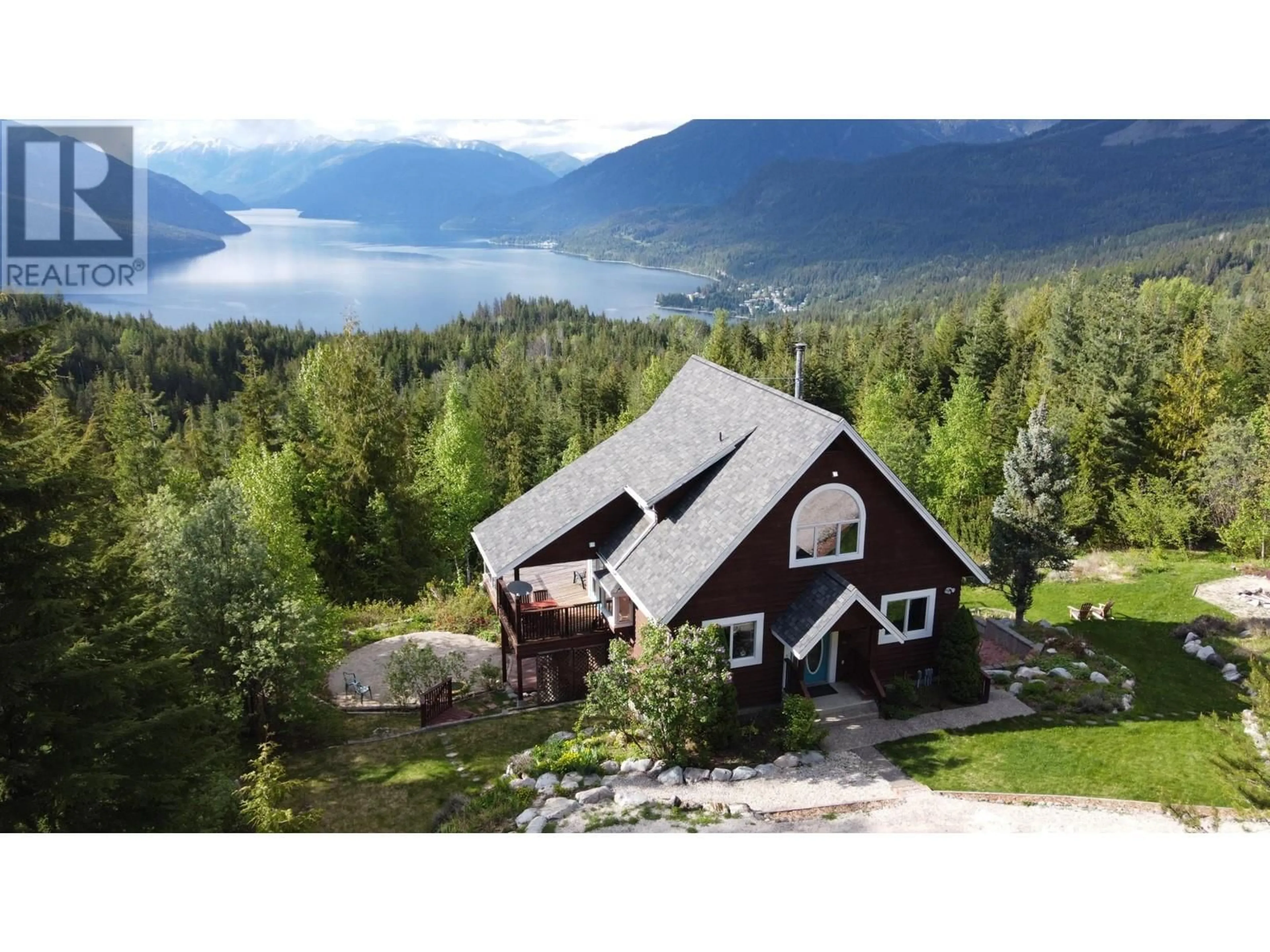 A pic from outside/outdoor area/front of a property/back of a property/a pic from drone, water/lake/river/ocean view for 8195 OMA ROAD, Silverton British Columbia V0G1S0