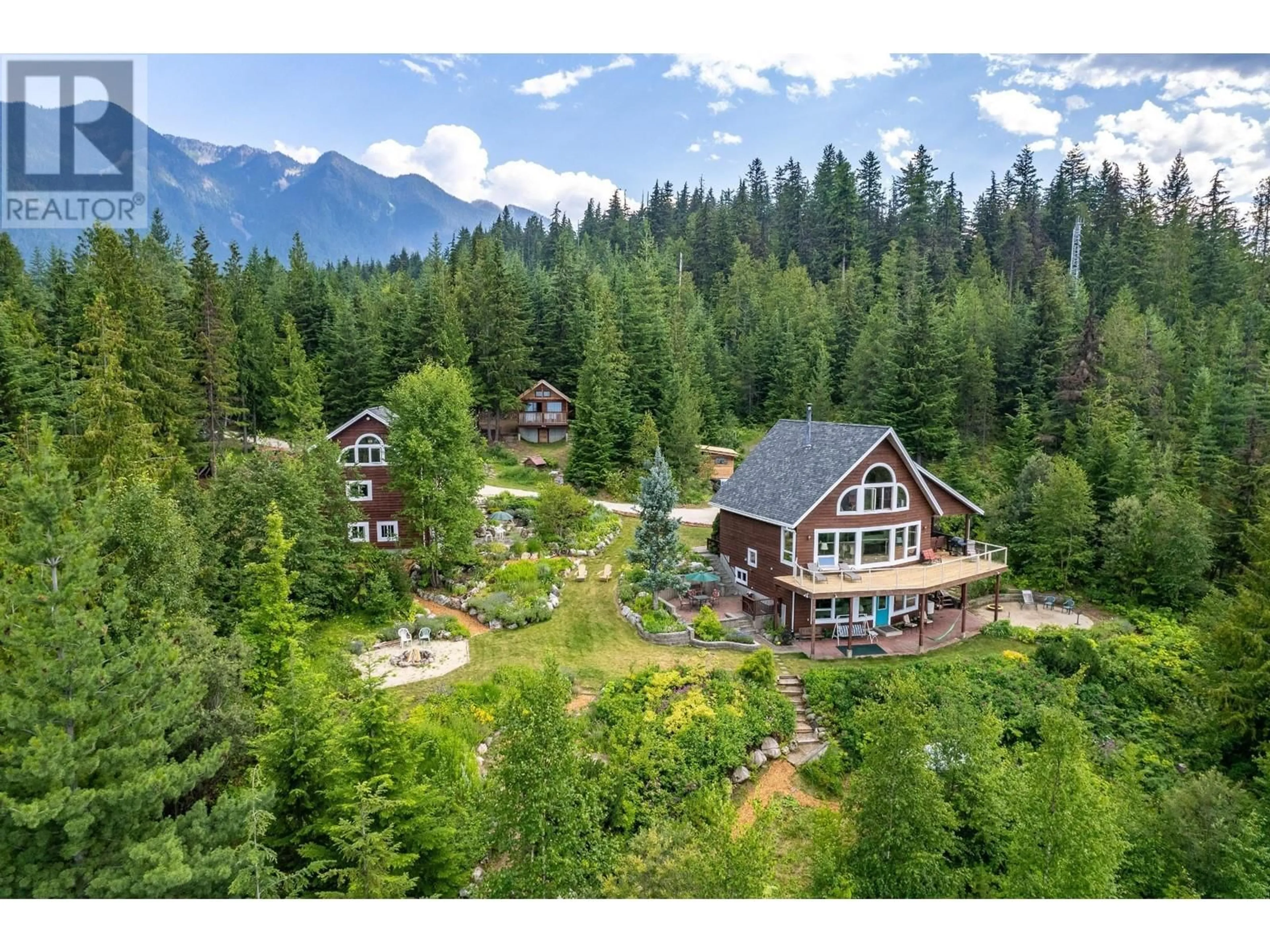 A pic from outside/outdoor area/front of a property/back of a property/a pic from drone, mountain view for 8195 OMA ROAD, Silverton British Columbia V0G1S0
