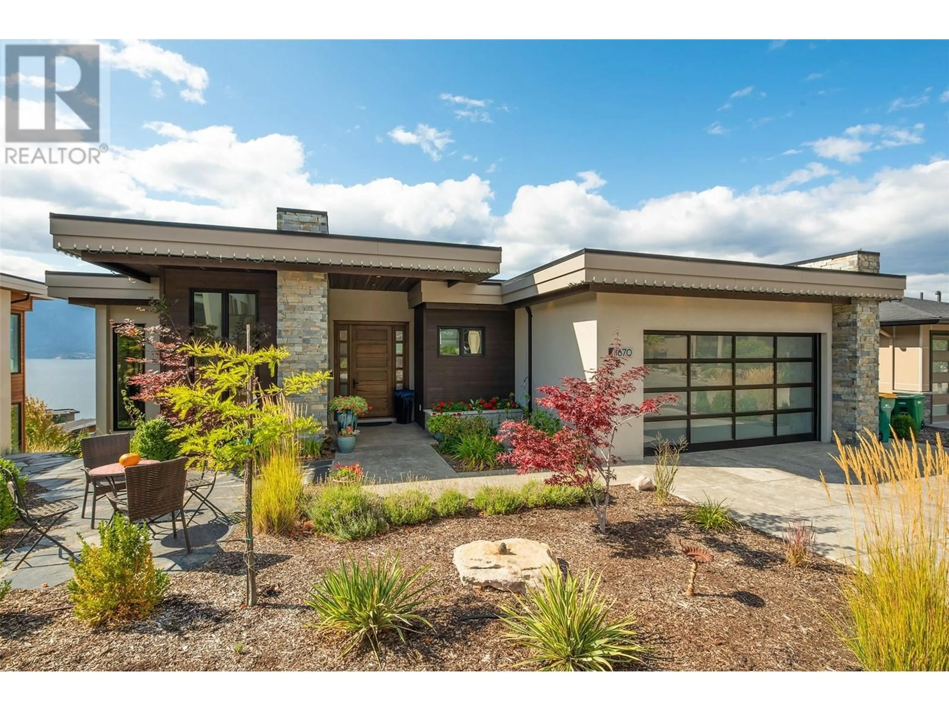 Home with brick exterior material, street for 1670 TRAVERTINE DRIVE, Lake Country British Columbia V4V2T4