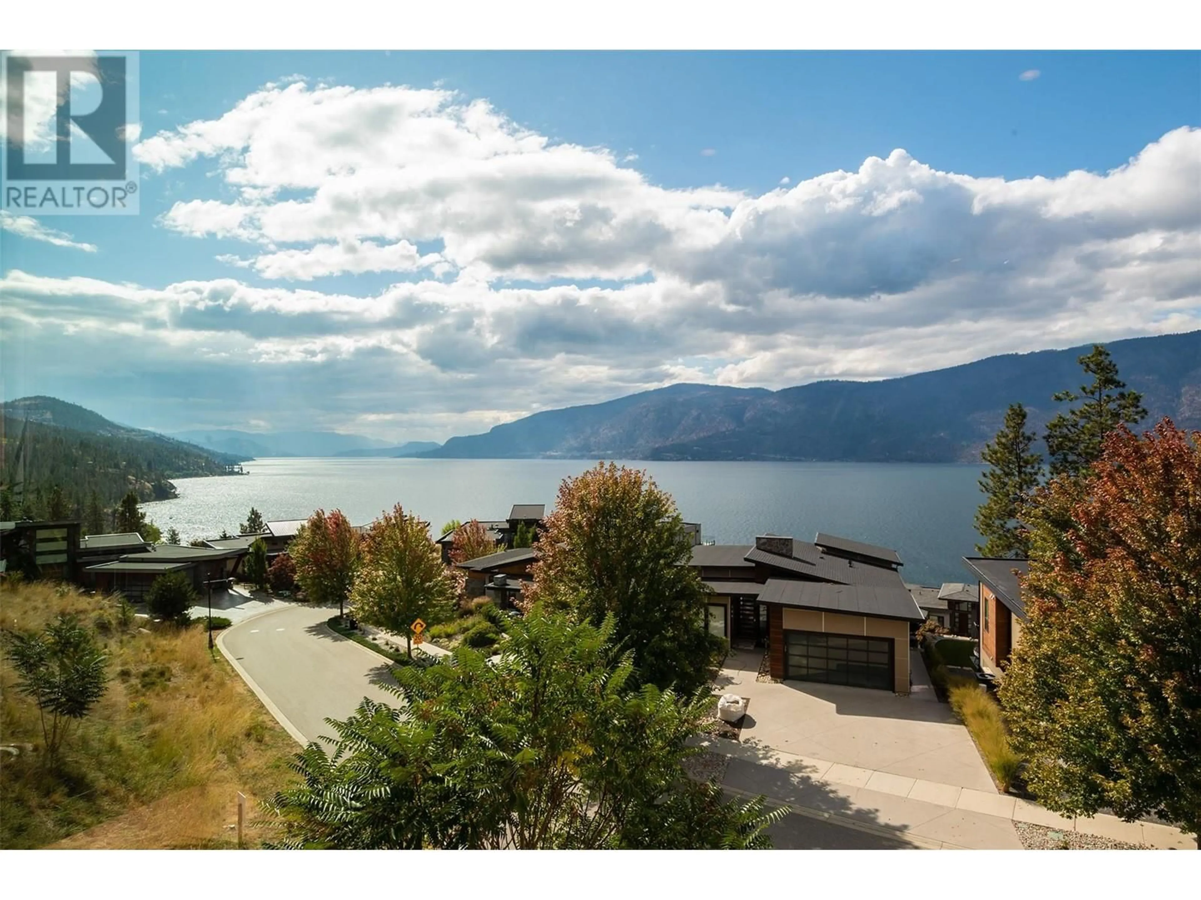 A pic from outside/outdoor area/front of a property/back of a property/a pic from drone, water/lake/river/ocean view for 1670 TRAVERTINE DRIVE, Lake Country British Columbia V4V2T4
