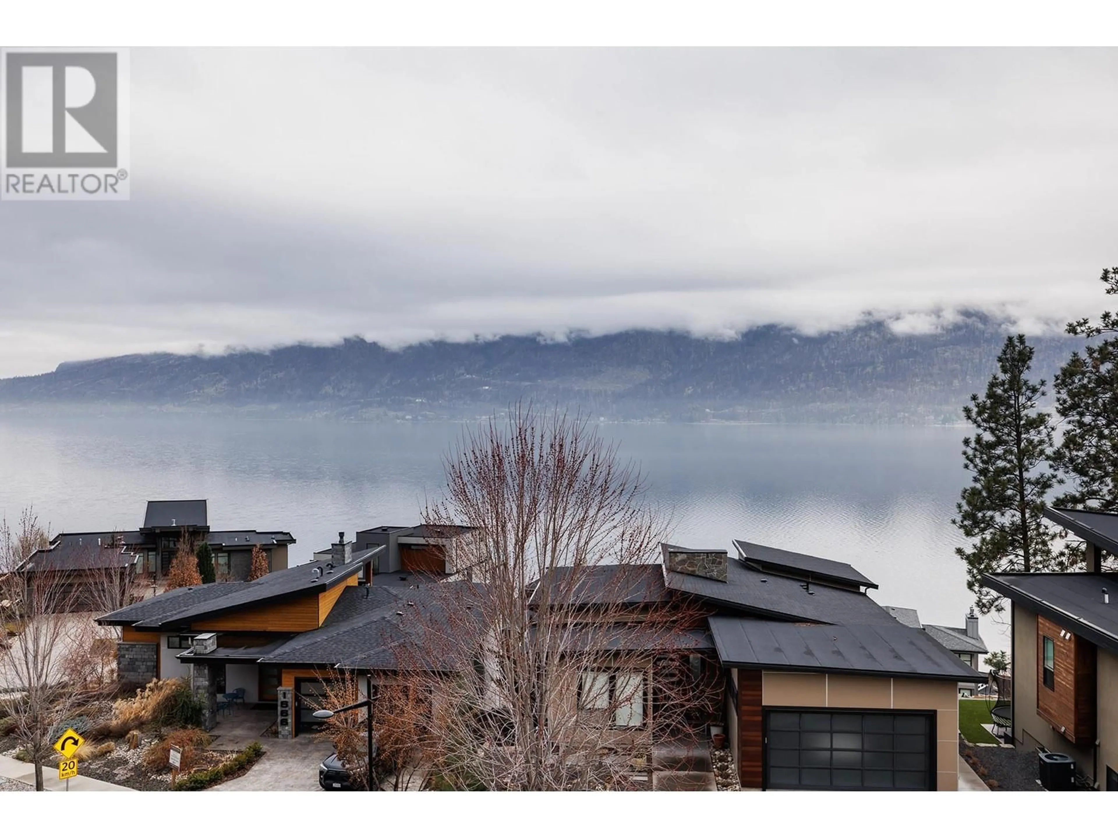 A pic from outside/outdoor area/front of a property/back of a property/a pic from drone, water/lake/river/ocean view for 1670 TRAVERTINE DRIVE, Lake Country British Columbia V4V2T4
