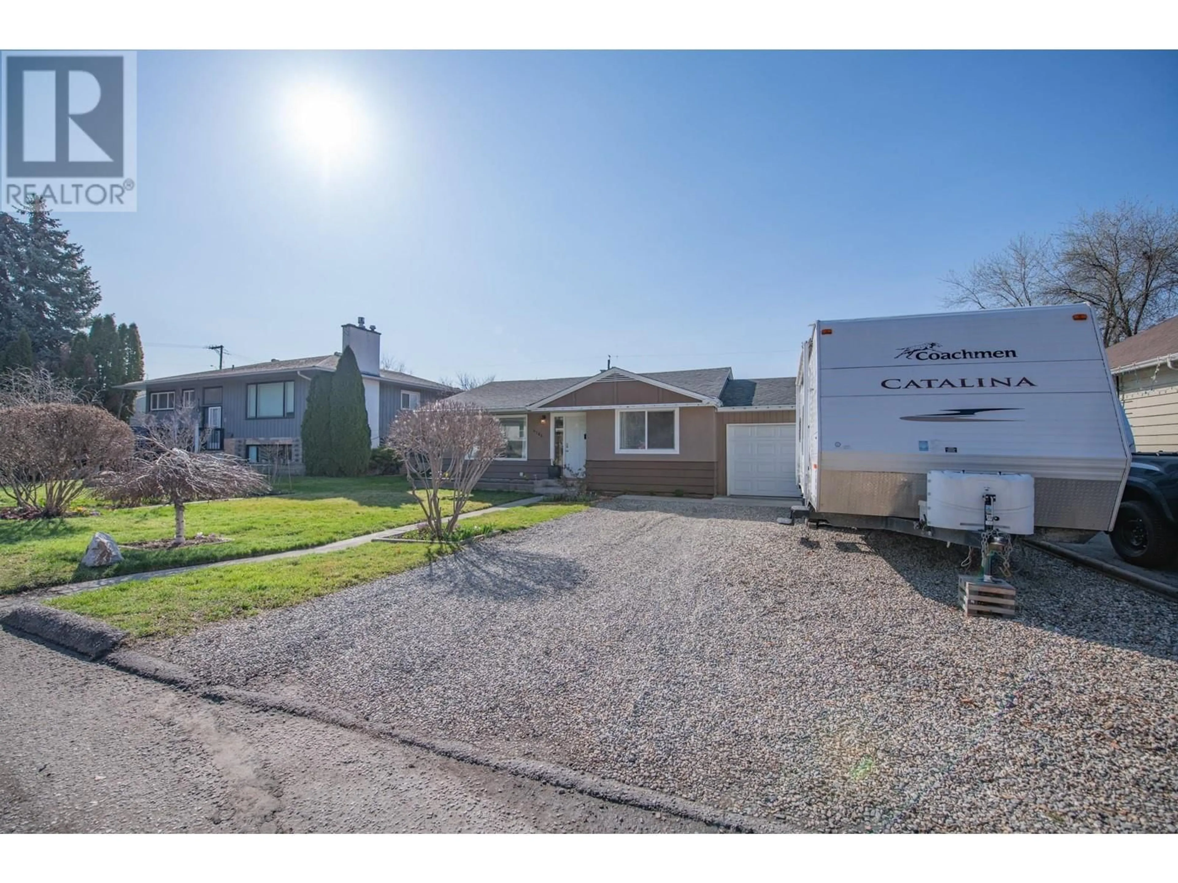 A pic from outside/outdoor area/front of a property/back of a property/a pic from drone, street for 4106 28 AVENUE, Vernon British Columbia V1T1X5