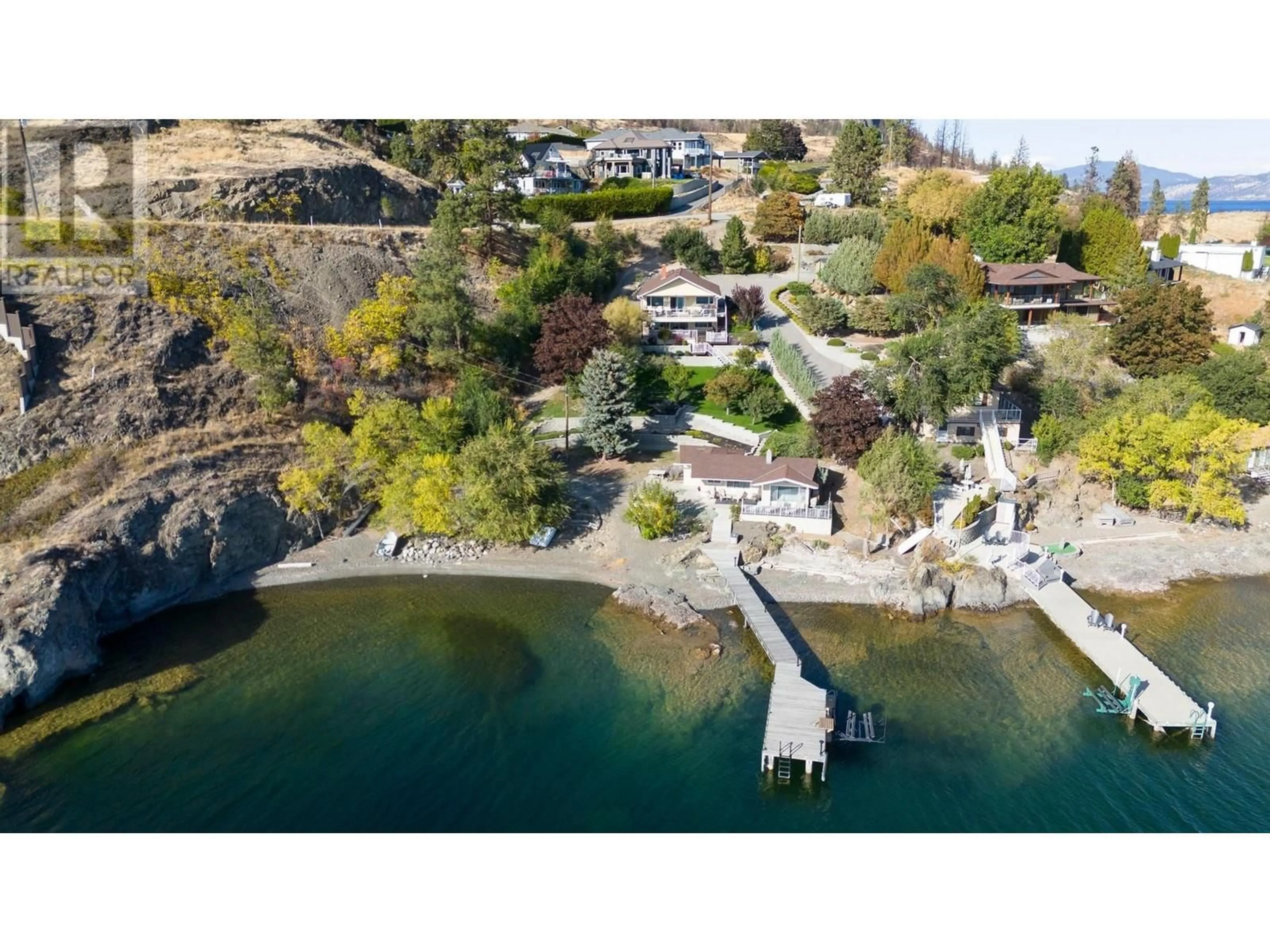 A pic from outside/outdoor area/front of a property/back of a property/a pic from drone, water/lake/river/ocean view for 37 TRADERS COVE ROAD, Kelowna British Columbia V1Z3S3