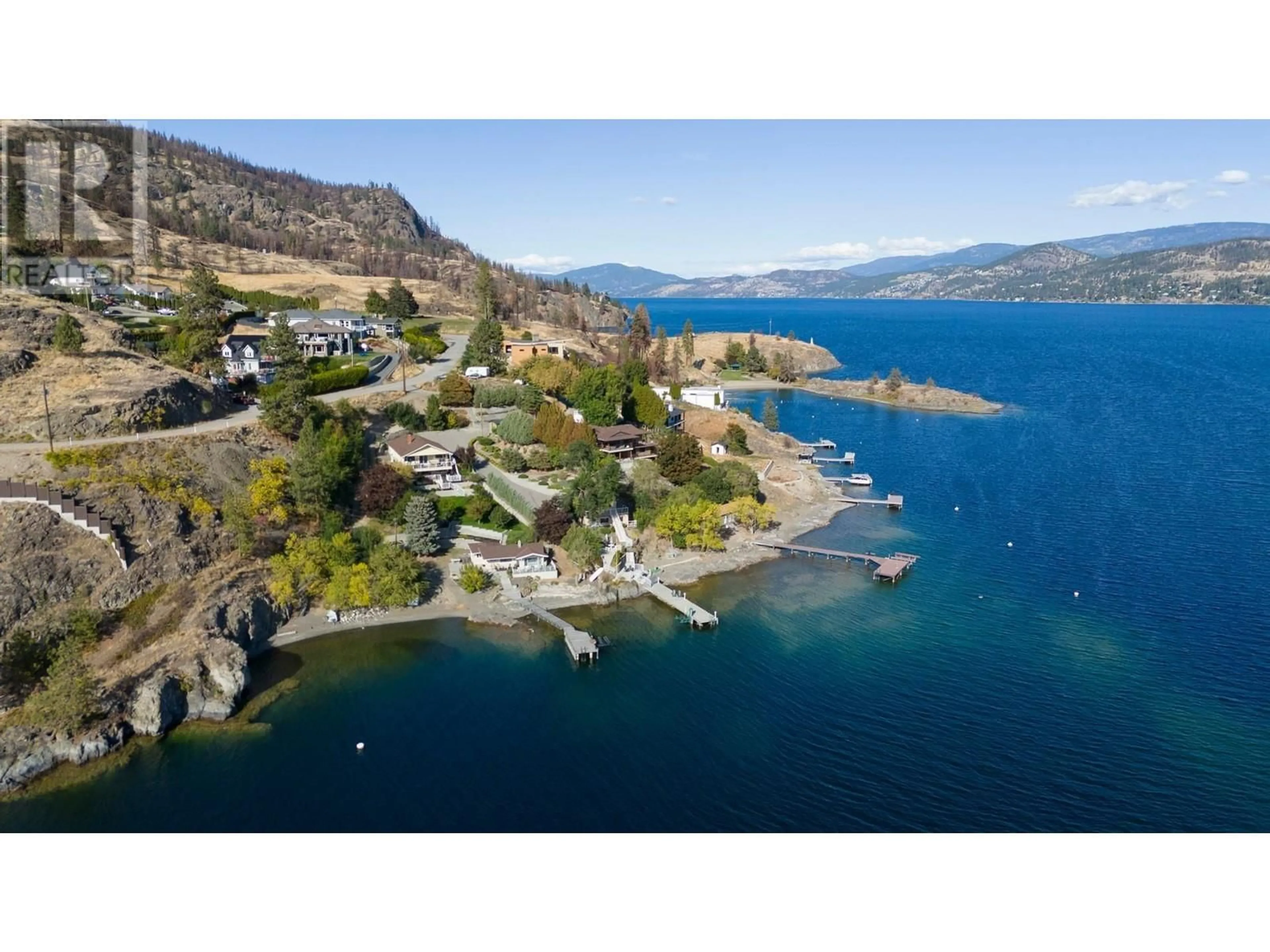 A pic from outside/outdoor area/front of a property/back of a property/a pic from drone, water/lake/river/ocean view for 37 TRADERS COVE ROAD, Kelowna British Columbia V1Z3S3