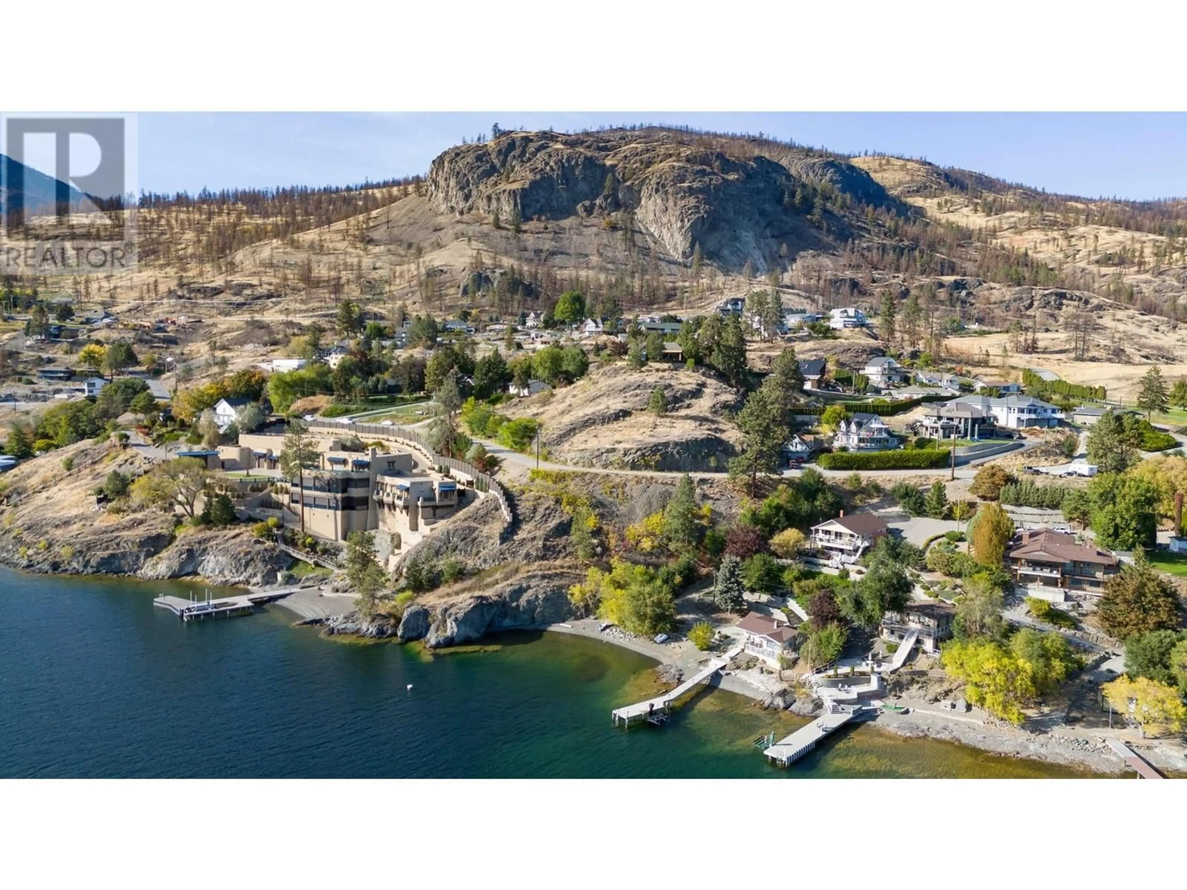 A pic from outside/outdoor area/front of a property/back of a property/a pic from drone, water/lake/river/ocean view for 37 TRADERS COVE ROAD, Kelowna British Columbia V1Z3S3