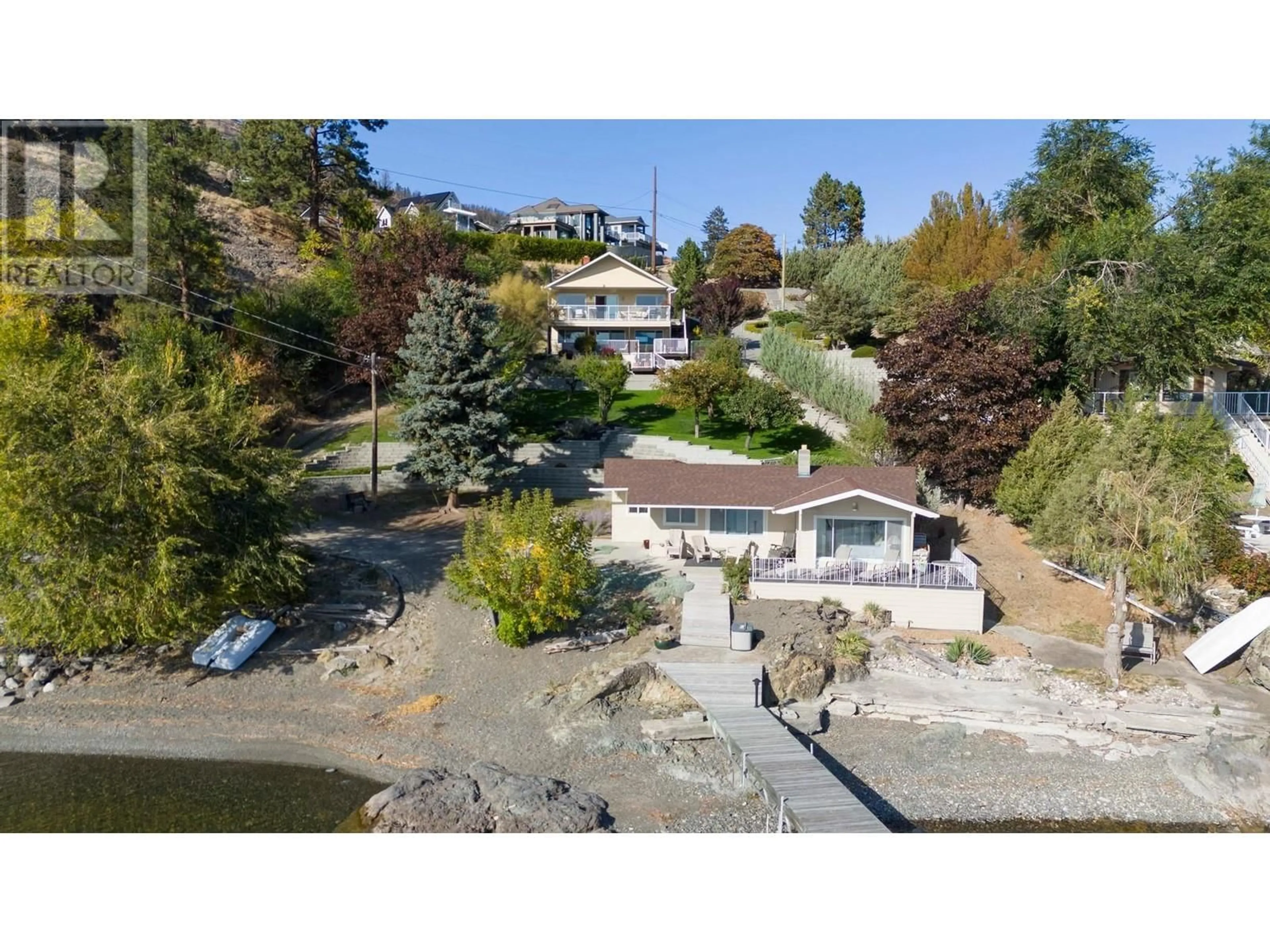A pic from outside/outdoor area/front of a property/back of a property/a pic from drone, water/lake/river/ocean view for 37 TRADERS COVE ROAD, Kelowna British Columbia V1Z3S3