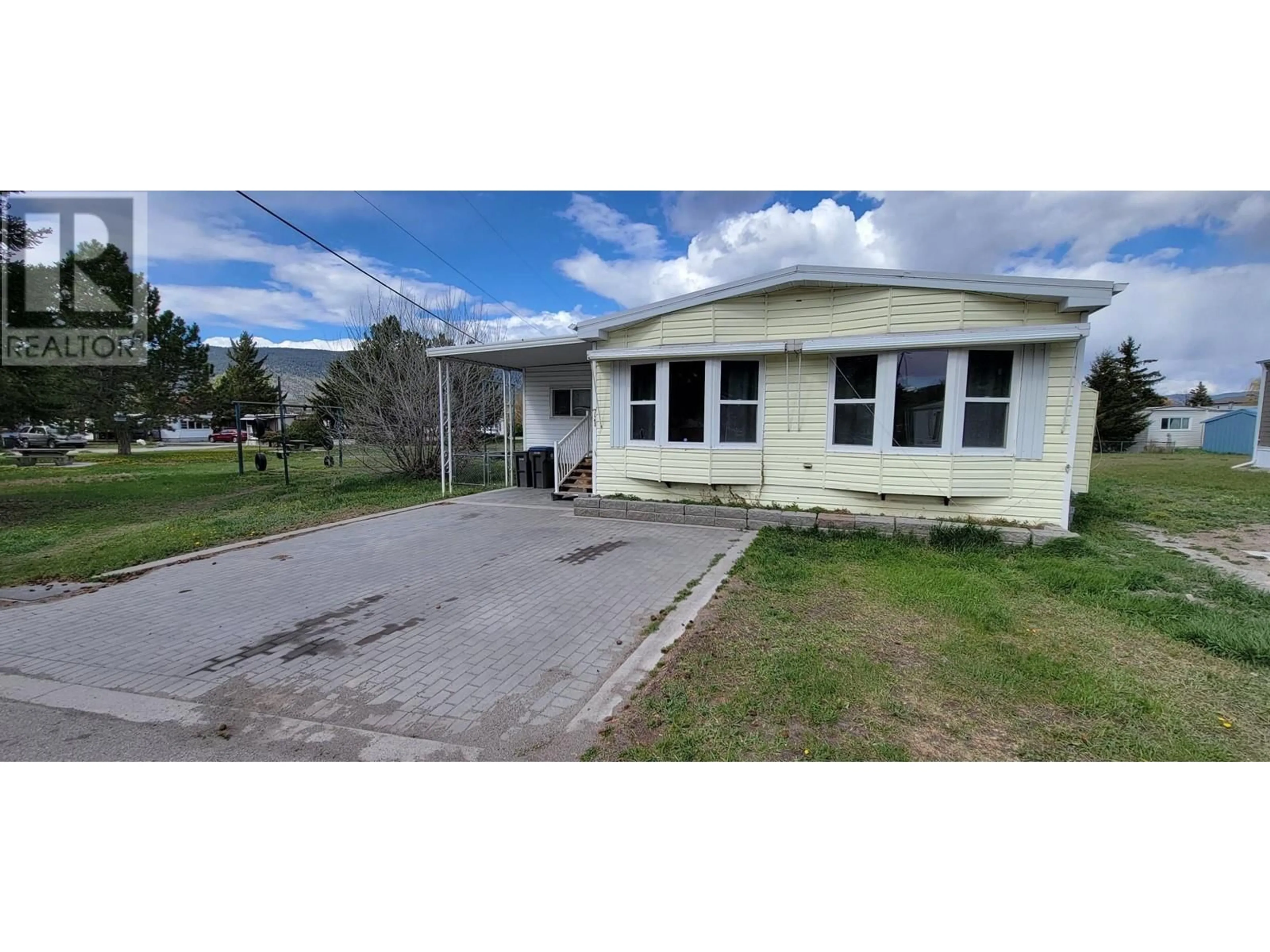 A pic from outside/outdoor area/front of a property/back of a property/a pic from drone, unknown for 71 - 2776 CLAPPERTON AVENUE, Merritt British Columbia V1K1B8