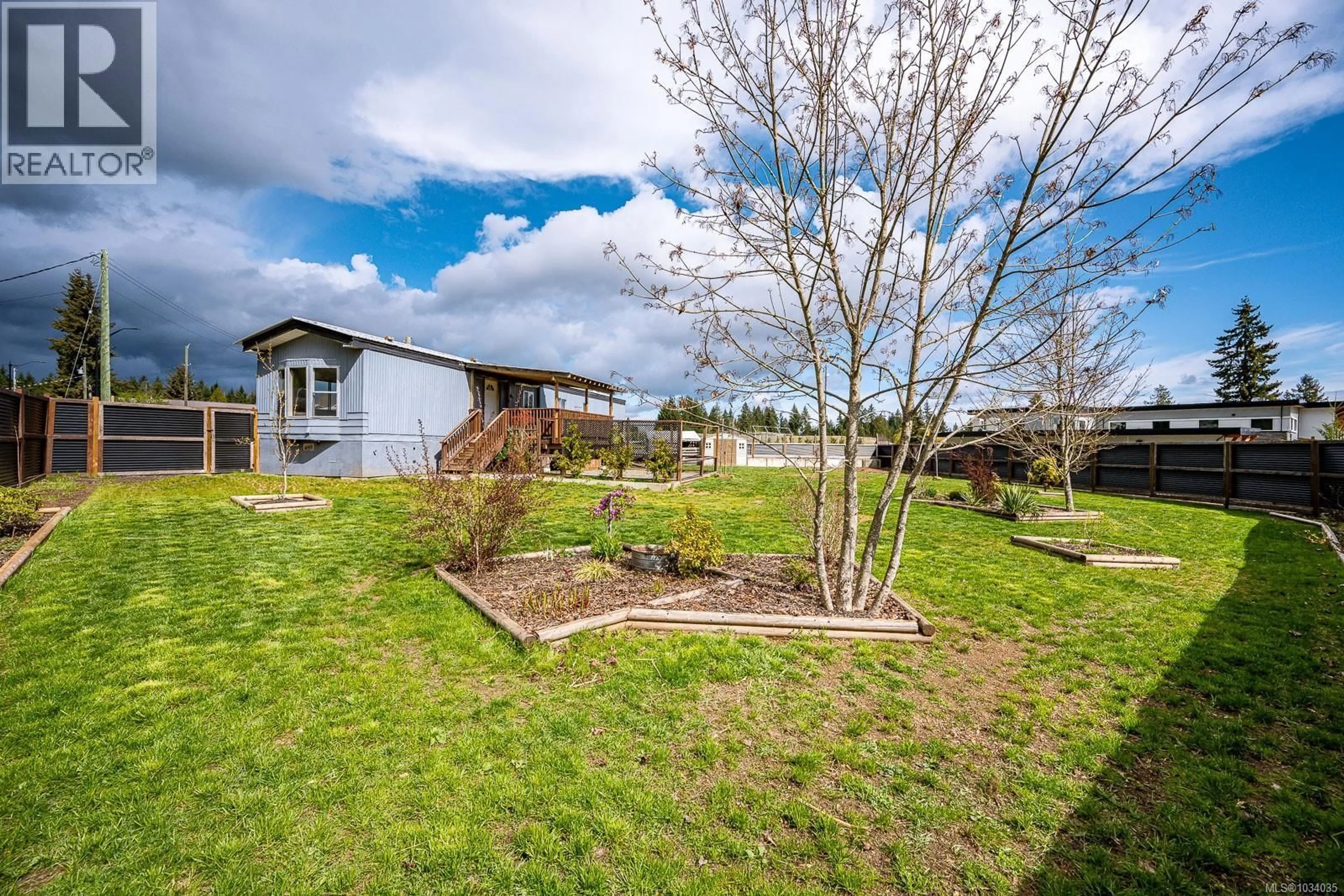 A pic from outside/outdoor area/front of a property/back of a property/a pic from drone, unknown for 3378 NIKKEI PLACE, Cumberland British Columbia V0R1S0