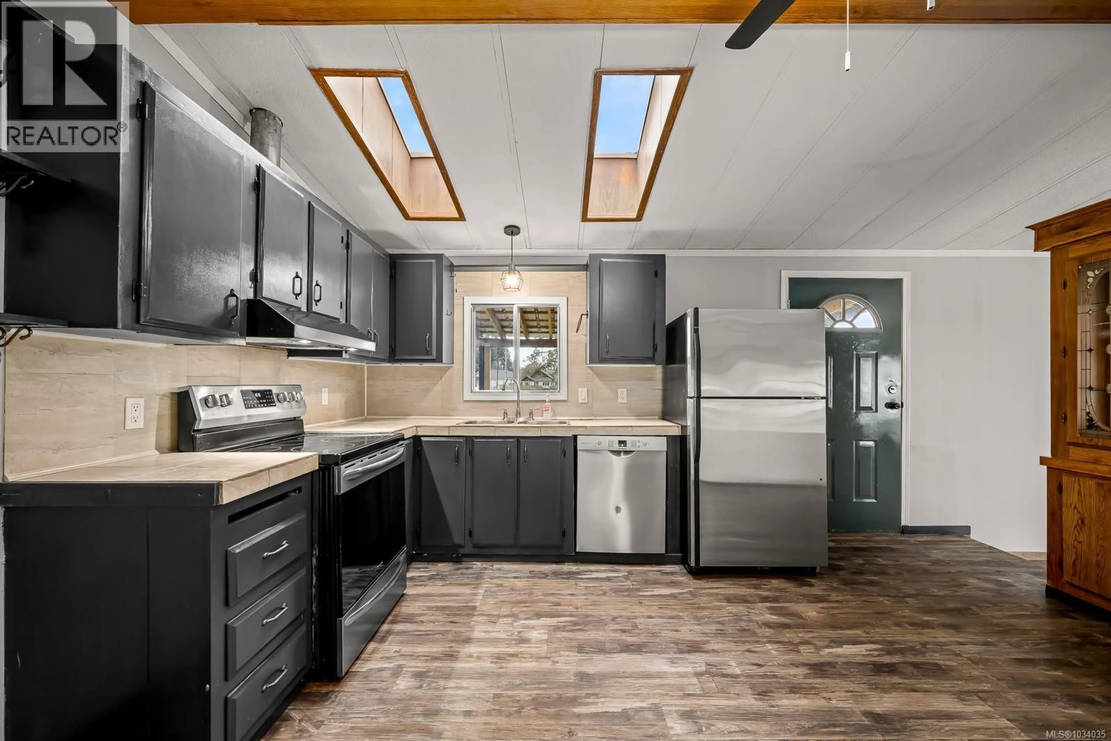 Open concept kitchen, unknown for 3378 NIKKEI PLACE, Cumberland British Columbia V0R1S0