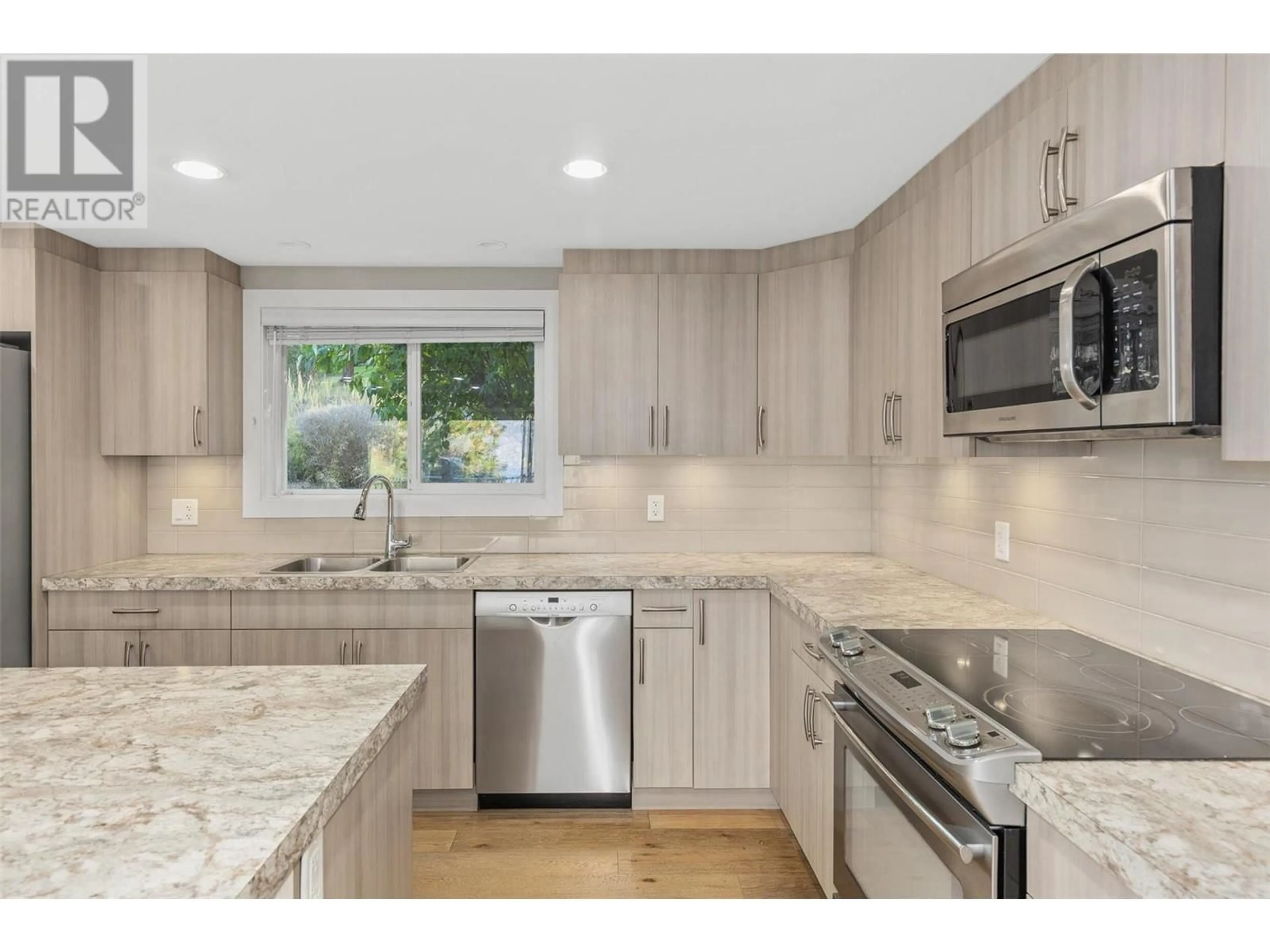 Open concept kitchen, ceramic/tile floor for 10914 HARE ROAD, Lake Country British Columbia V4V2H6