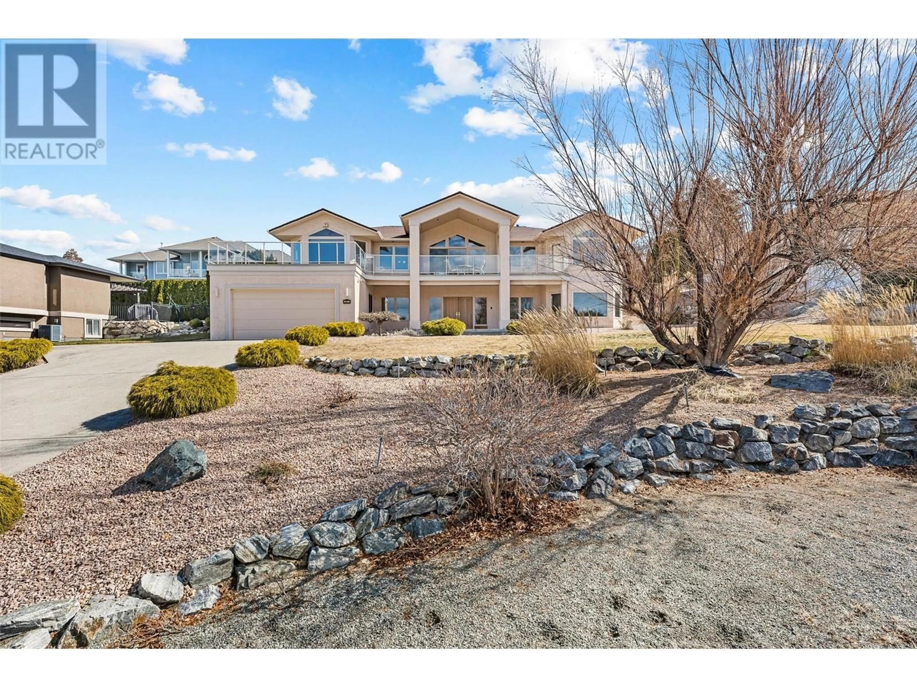 A pic from outside/outdoor area/front of a property/back of a property/a pic from drone, water/lake/river/ocean view for 307 SANDPIPER COURT, Kelowna British Columbia V1W4K7