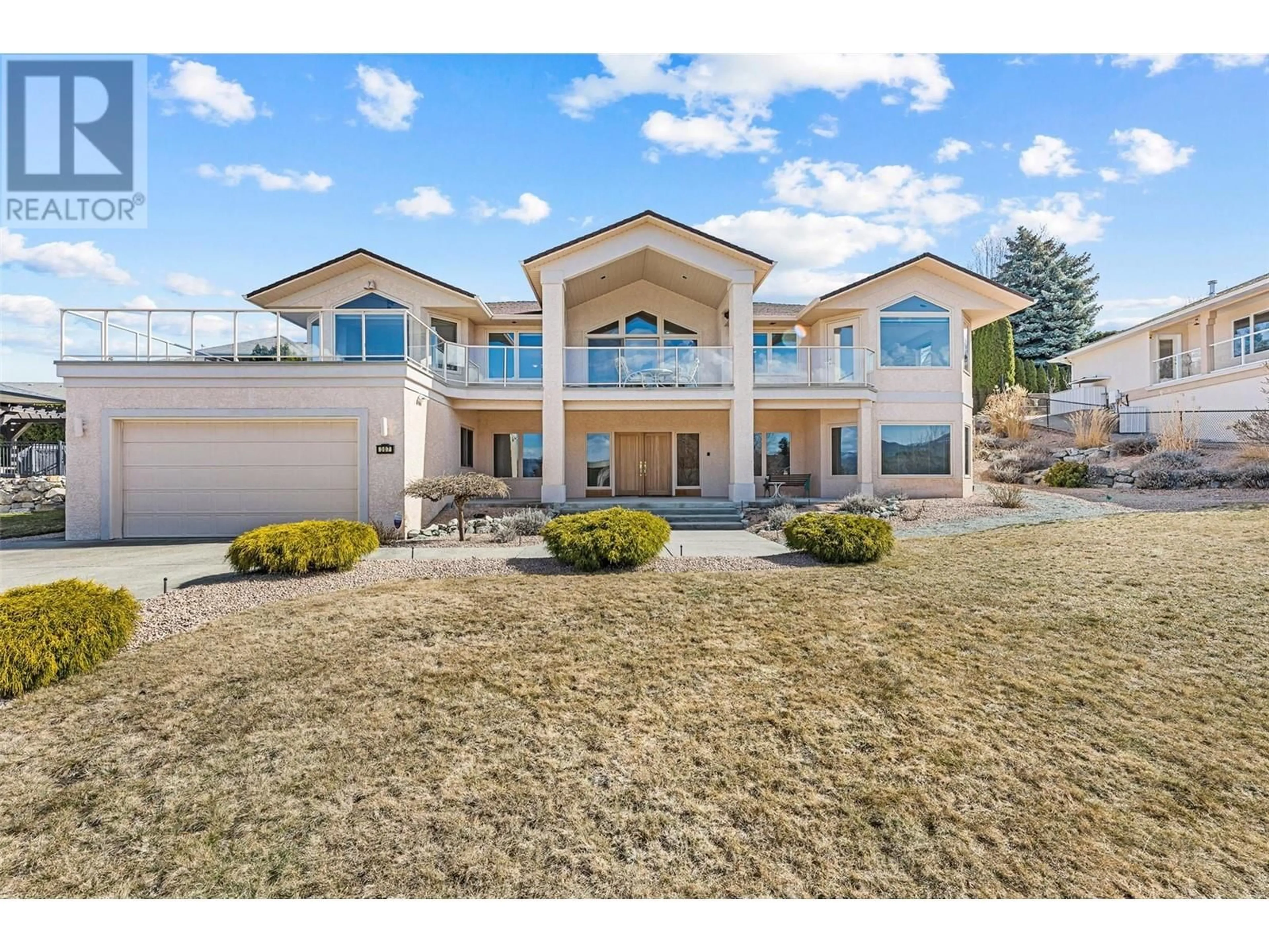 A pic from outside/outdoor area/front of a property/back of a property/a pic from drone, unknown for 307 SANDPIPER COURT, Kelowna British Columbia V1W4K7