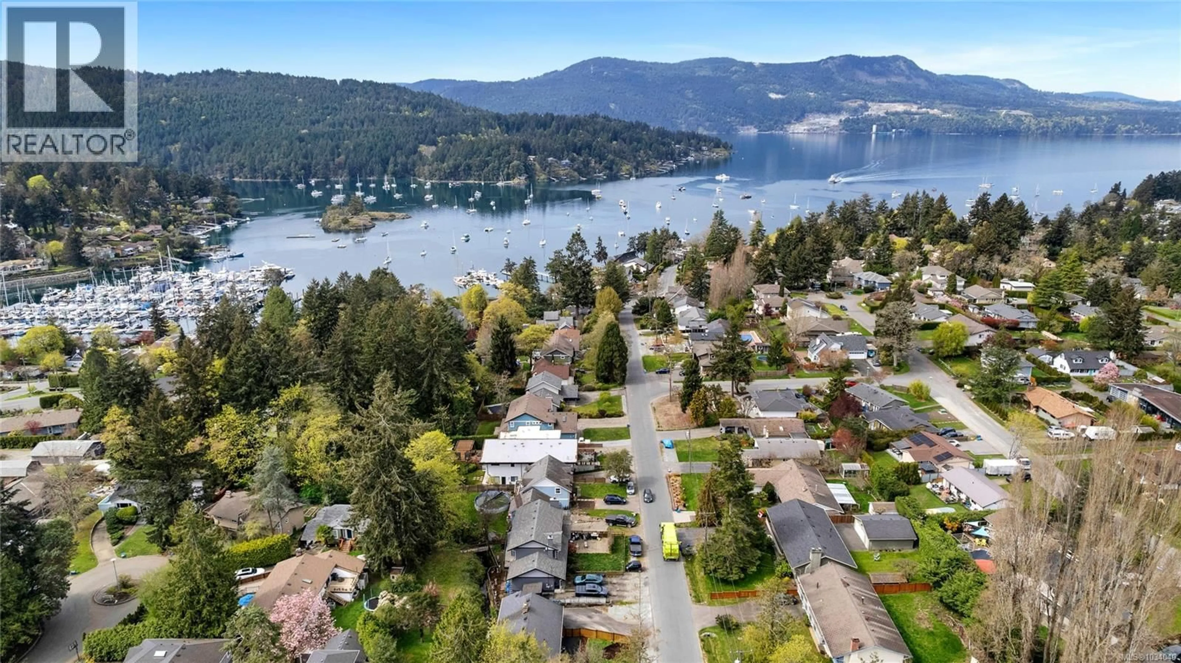 A pic from outside/outdoor area/front of a property/back of a property/a pic from drone, water/lake/river/ocean view for 955 SLUGGETT ROAD, Central Saanich British Columbia V8M1E4