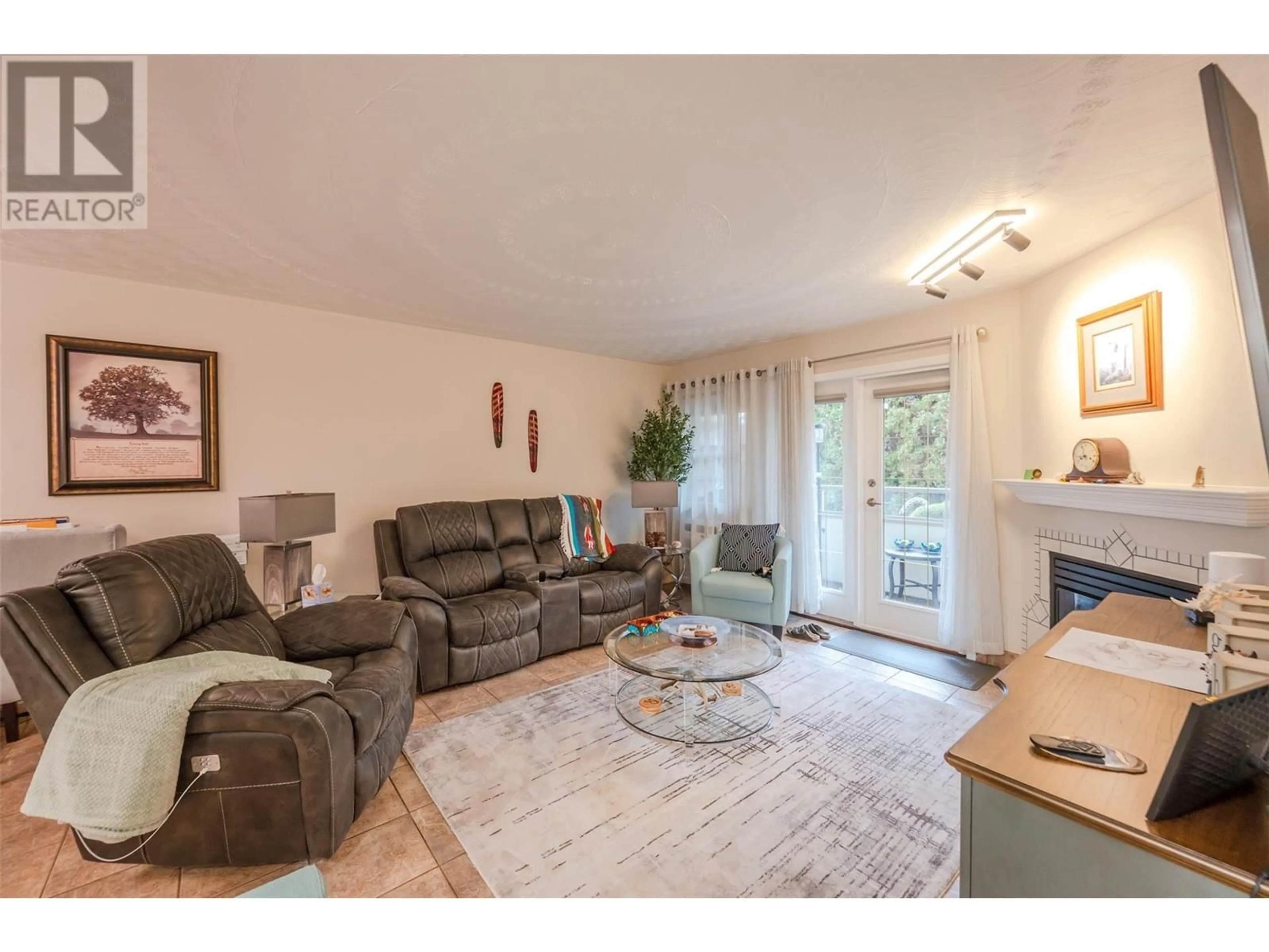 Living room with furniture, unknown for 103 - 8408 JUBILEE ROAD, Summerland British Columbia V0H1Z5