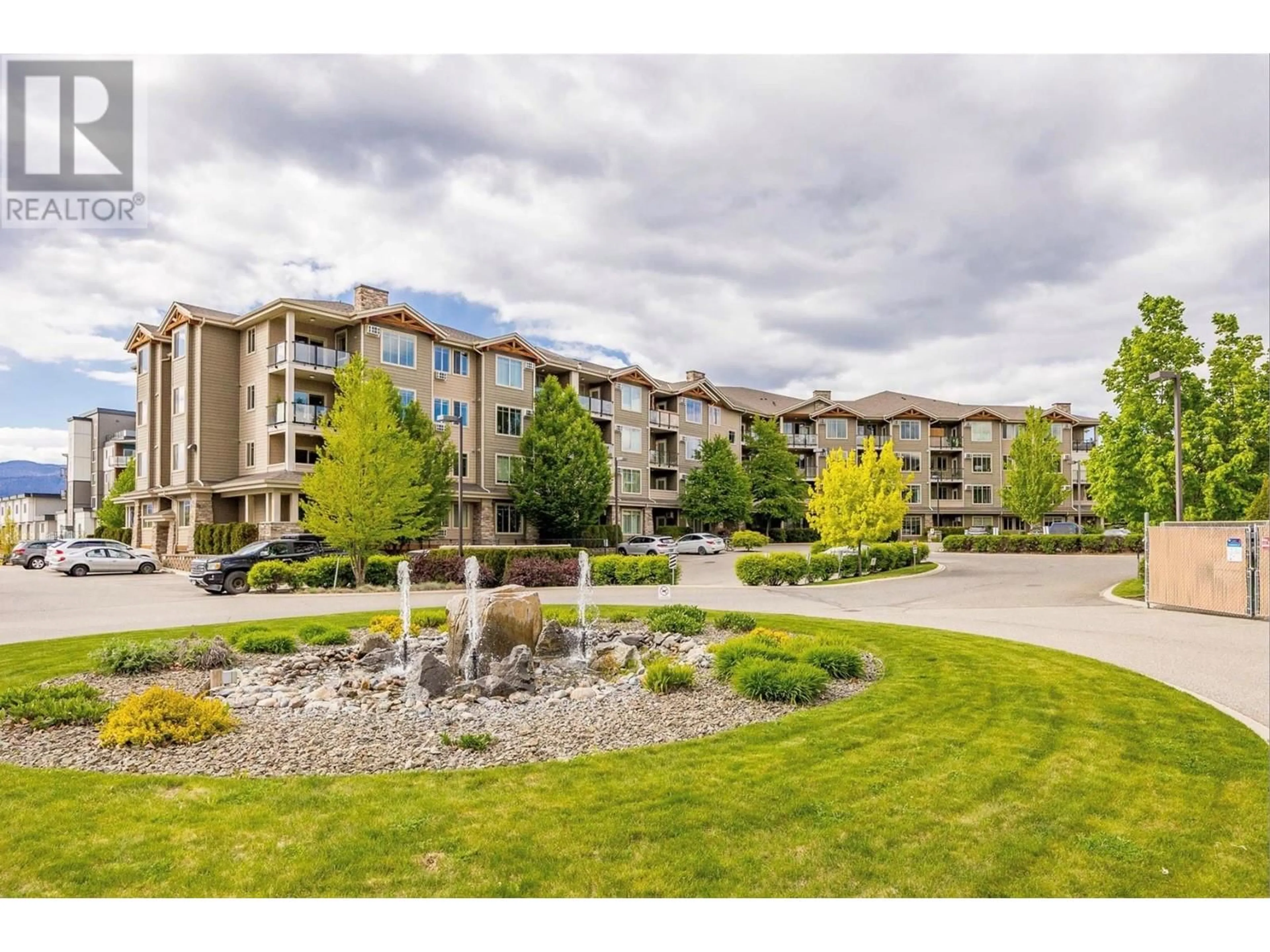 A pic from outside/outdoor area/front of a property/back of a property/a pic from drone, mountain view for 3733 Casorso Road Unit# 315, Kelowna British Columbia V1W5E3