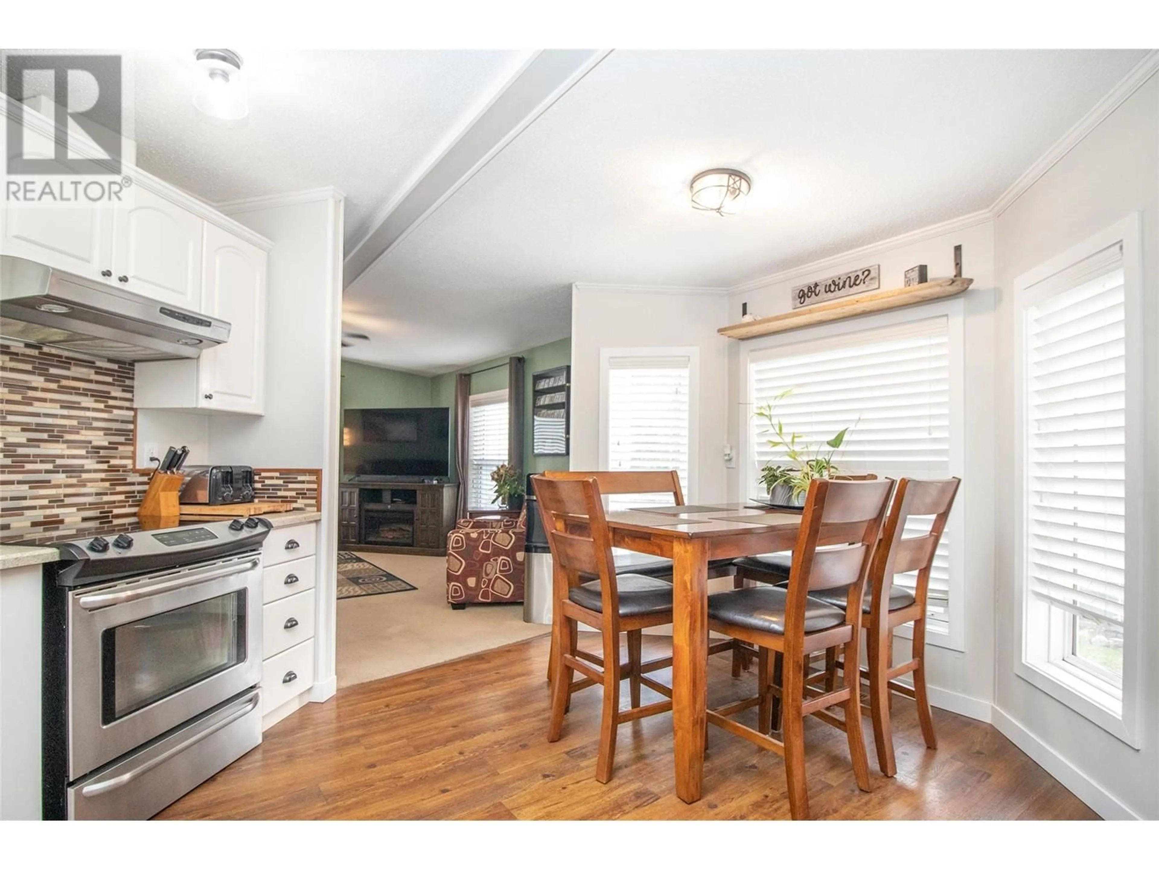 Open concept kitchen, wood/laminate floor for 10 - 3270 SHANNON LAKE ROAD, West Kelowna British Columbia V4T1V4