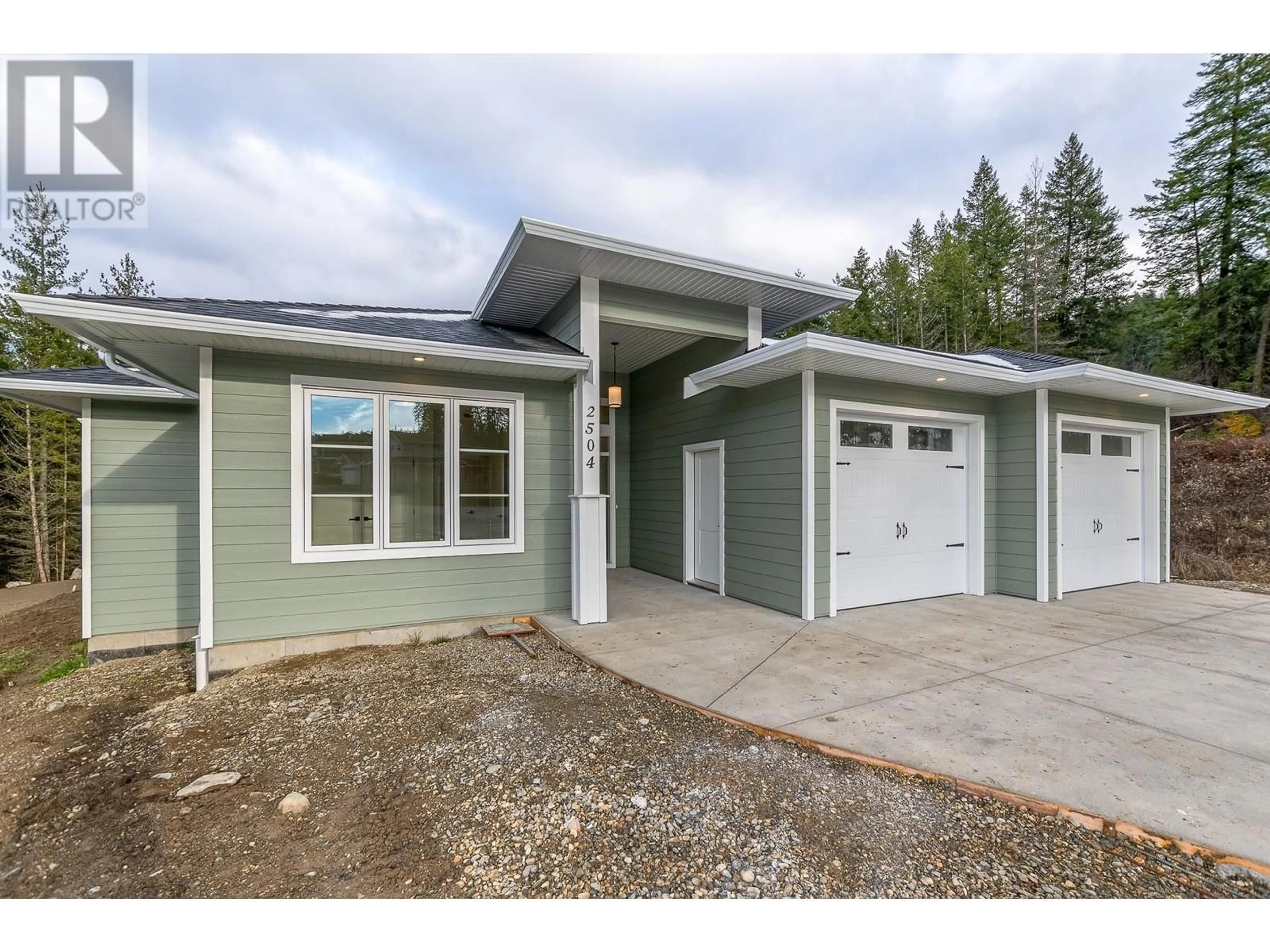 Home with vinyl exterior material, street for 2504 FOX GLEN WAY, Blind Bay British Columbia V0E1H0