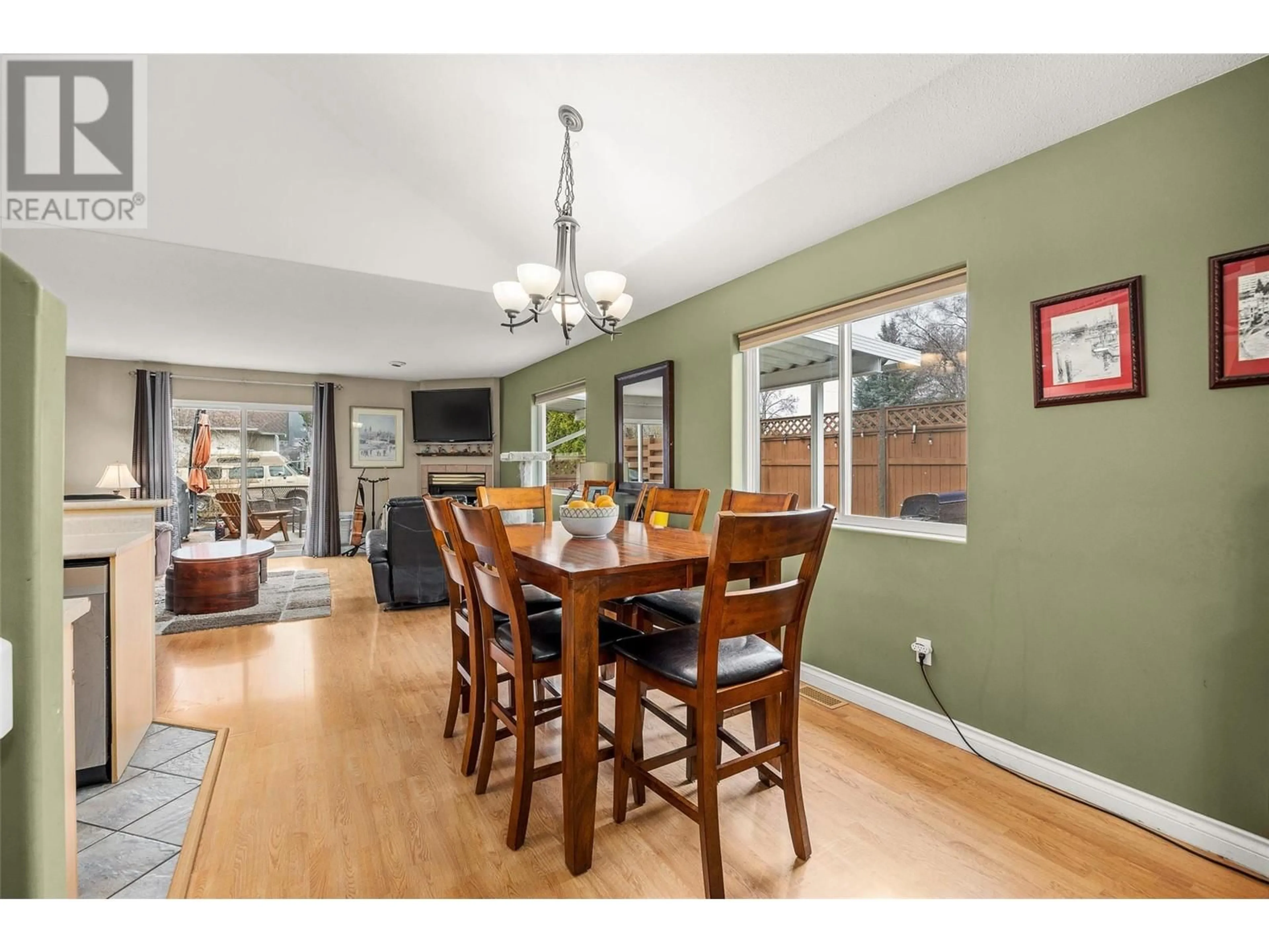 Dining room, wood/laminate floor for 100 VERNA COURT, Kelowna British Columbia V4T2G3